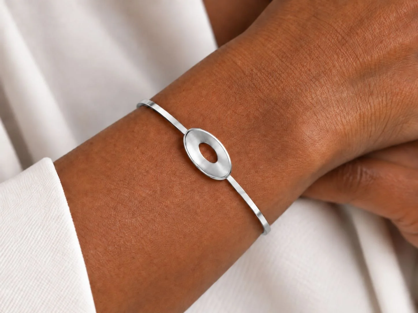 Sterling silver reflection bangle on model.jpg