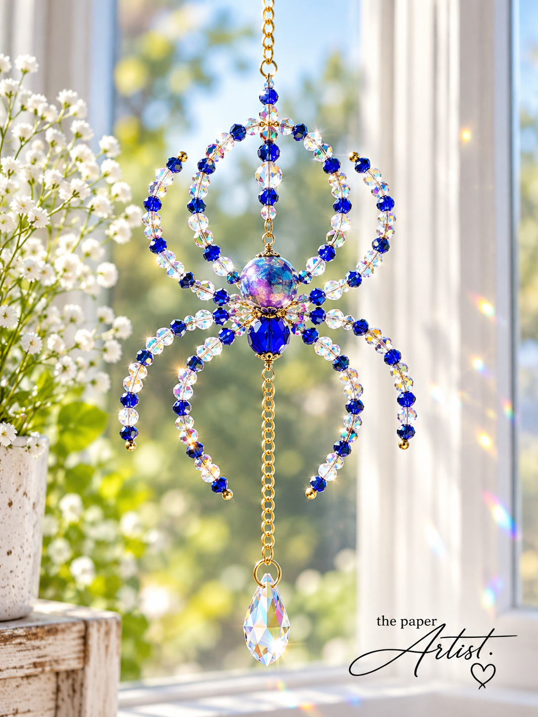 Handmade beaded spider suncatchers for Halloween window decorations blue