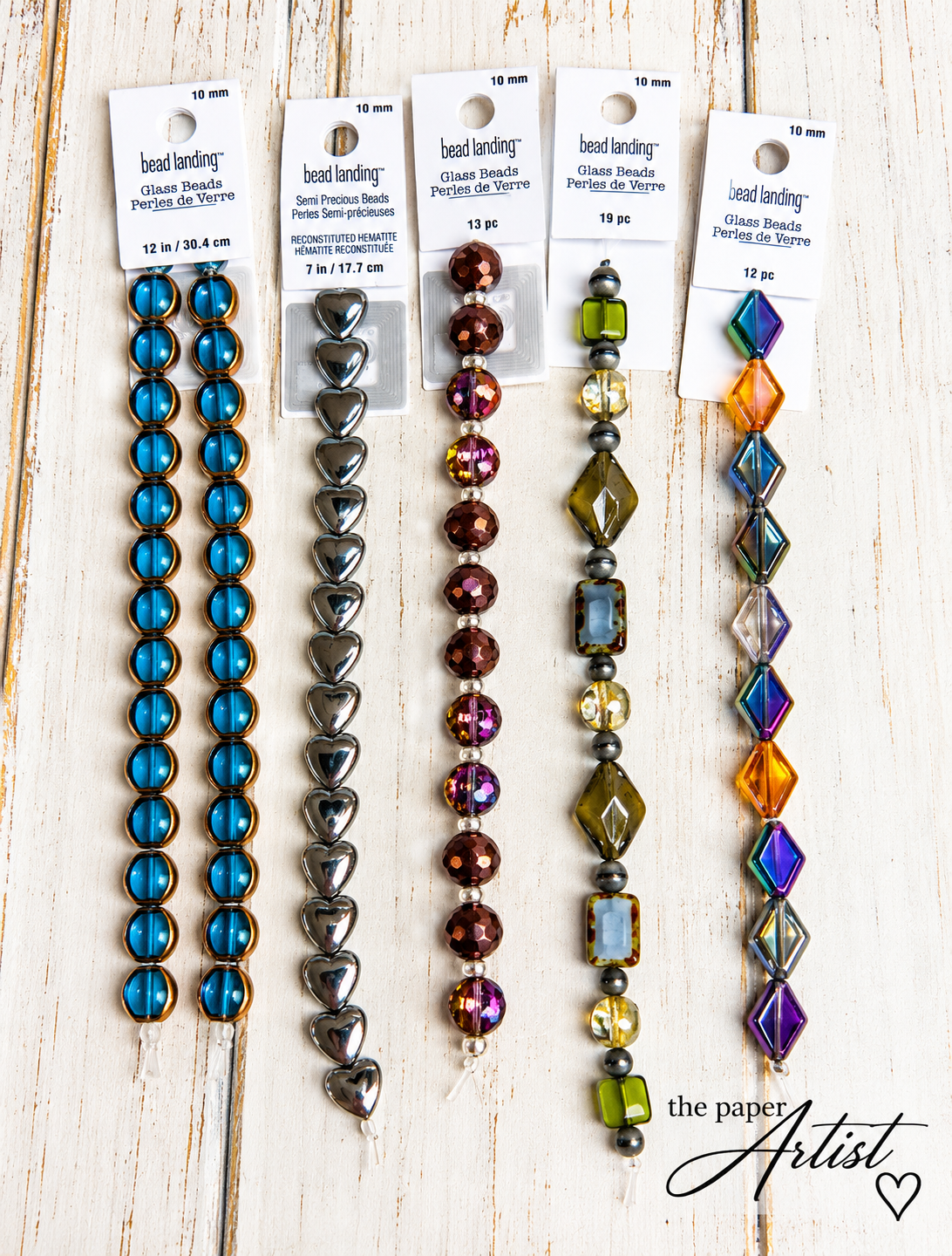 Colorful glass beads, metallic hematite hearts, and decorative jewelry making beads.