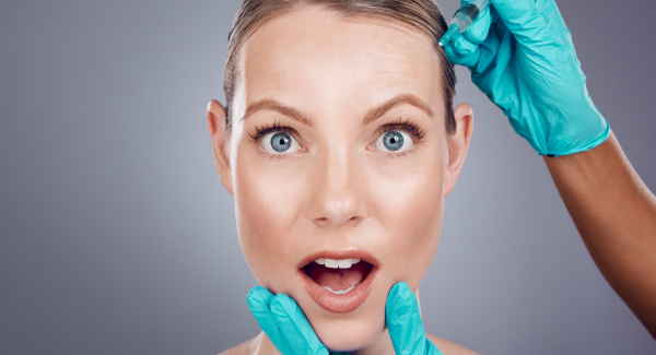 Woman receiving facial PRP injection