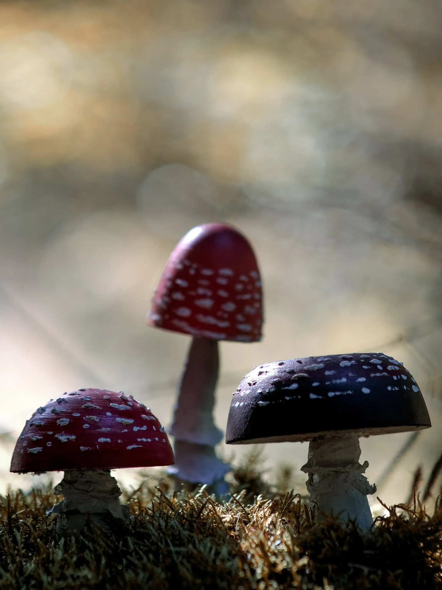 Handmade wooden toadstools and mushroom decorations inspired by enchanted woodland walks