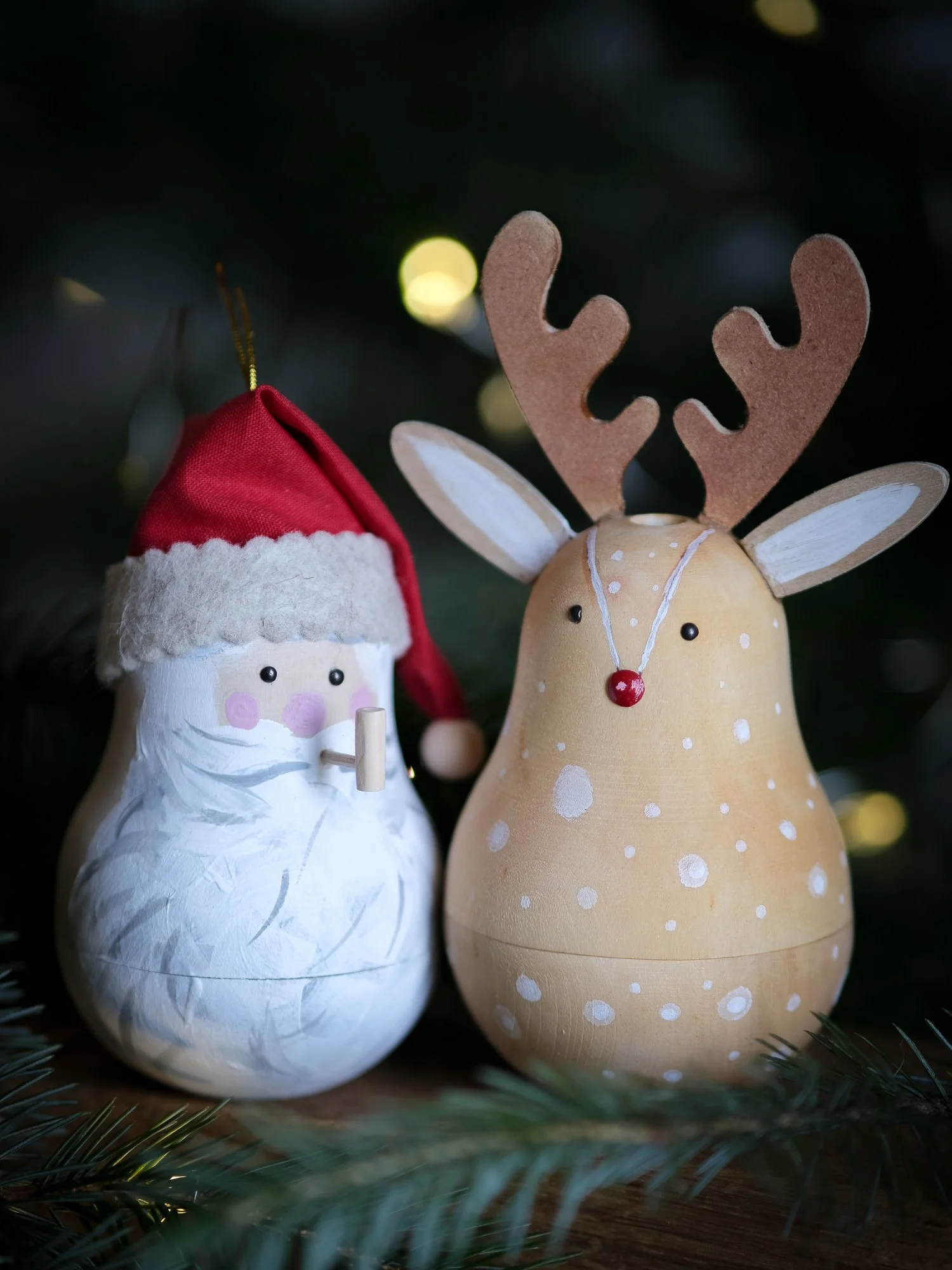Handmade rustic Santa Christmas ornament with a white beard, rosy cheeks and red hat, with a tiny note to santa inside