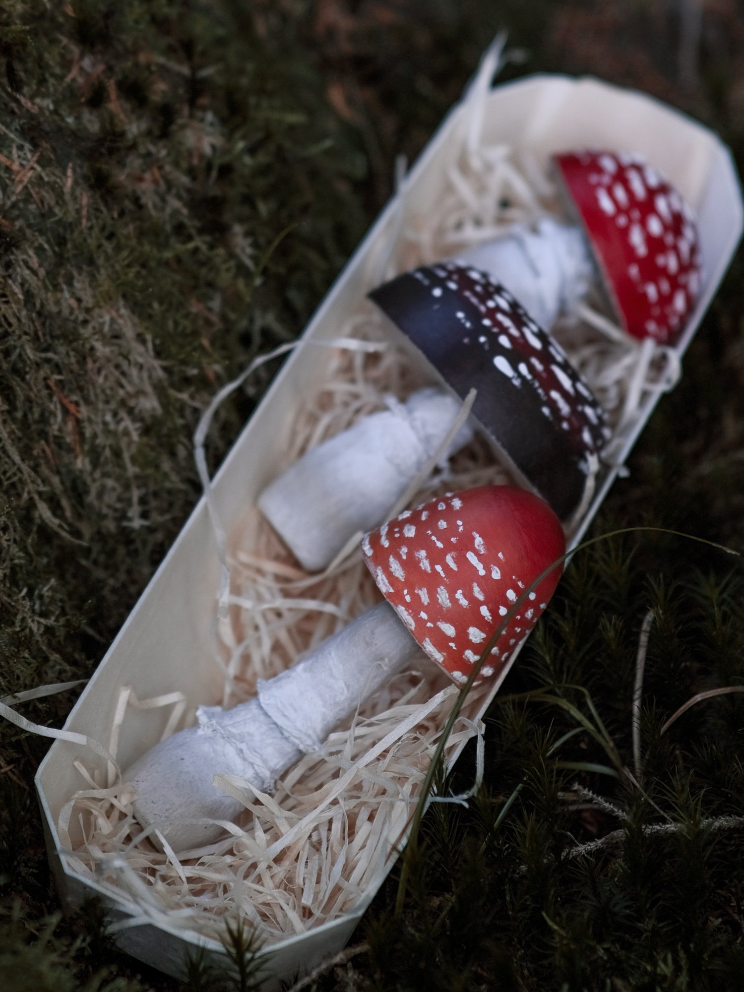 Handmade wooden toadstools and mushroom decorations inspired by enchanted woodland walks