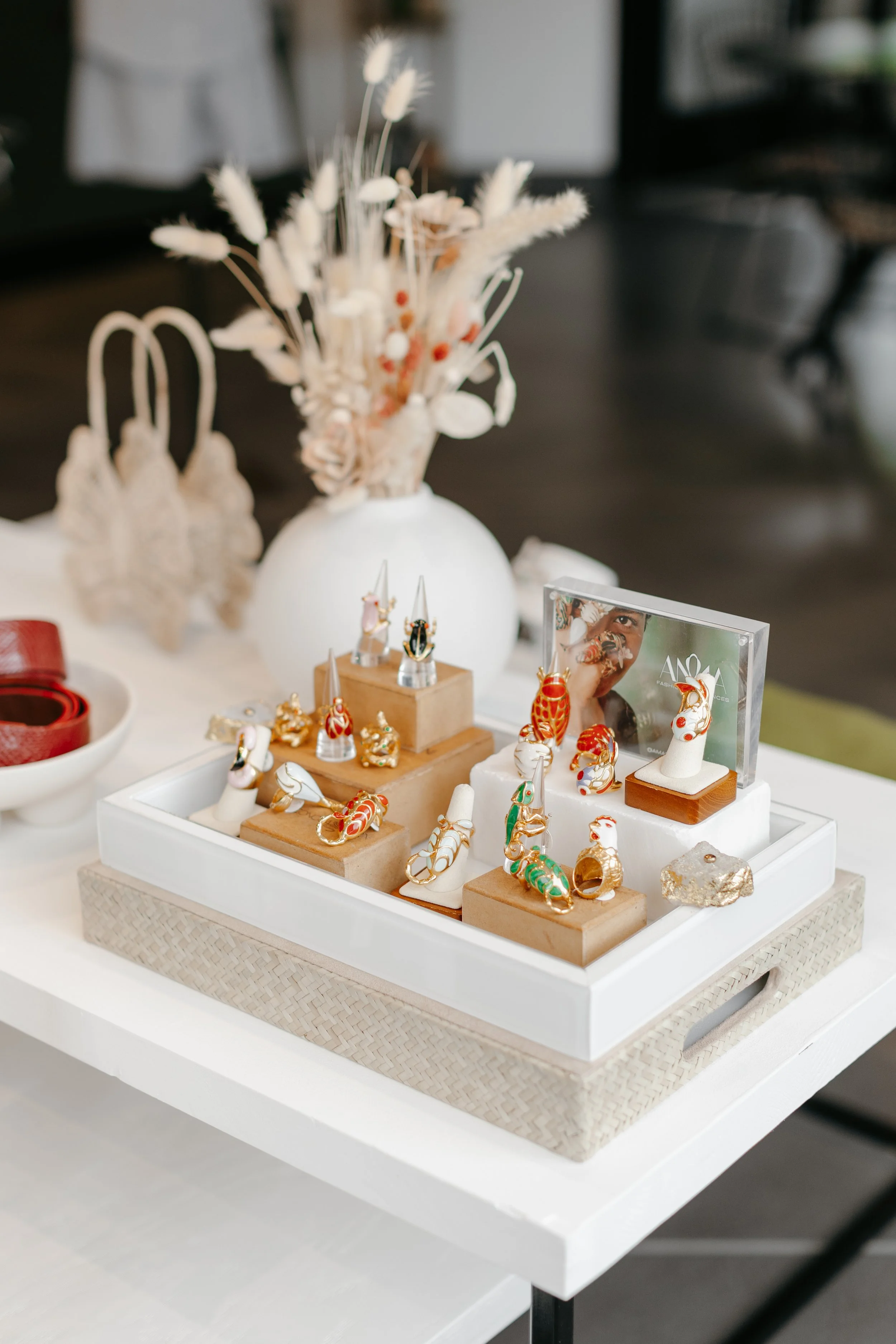Display on a table with custom-made jewelry. DistriktF Park City Utah Rental Space.