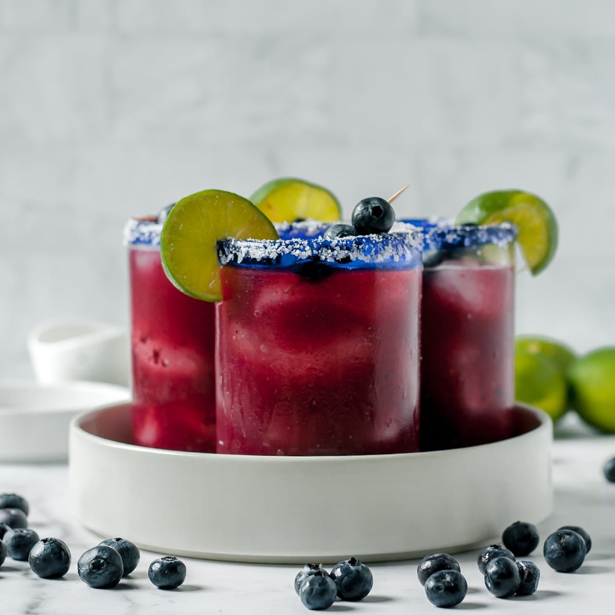 Blueberry Margarita
2 parts tequila Blanco
1 part triple sec or orange liquor
1 part honey simple syrup (or regular simple syrup)
½ part fresh lime juice
2 parts blueberry puree (or any other fruit puree of your choice)