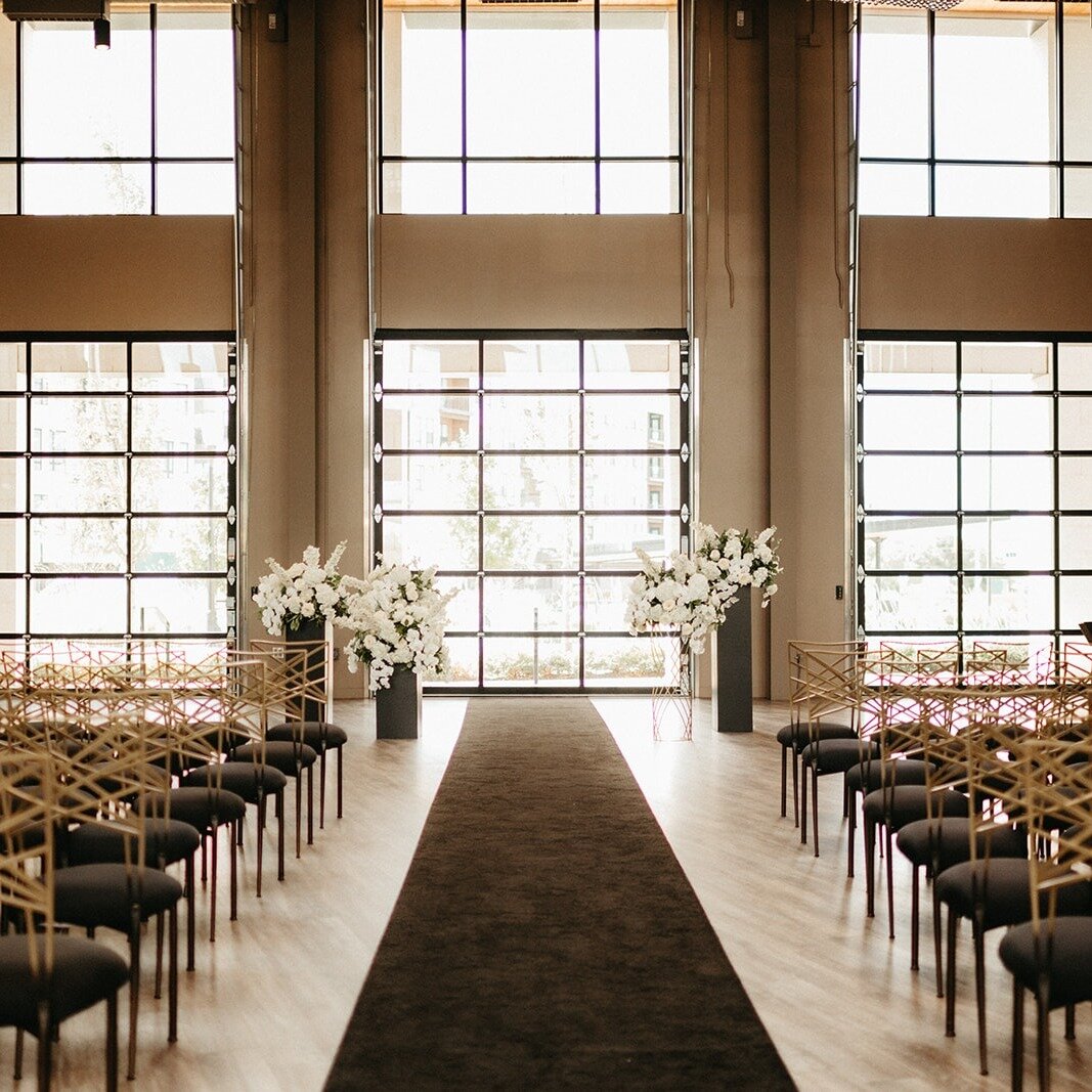 How to design a simple but glamorous ceremony setup in the Social Hall: 

Work with @mmjevents to select a luxurious black aisle runner from @aidenandgrace, gorgeous white florals by @andrewthomasdesign  and our house gold Fanfare Chairs from @chamel
