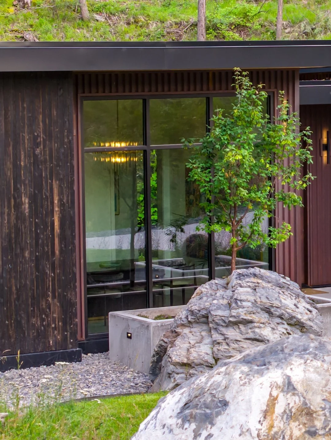 Introducing St&ouml;nehaus
Nestled into the raw rock formations of Angel Point, this architectural sanctuary is completely immersed in nature. Featuring custom snap-tie concrete planters and a seamless integrated water fountain, every detail is built