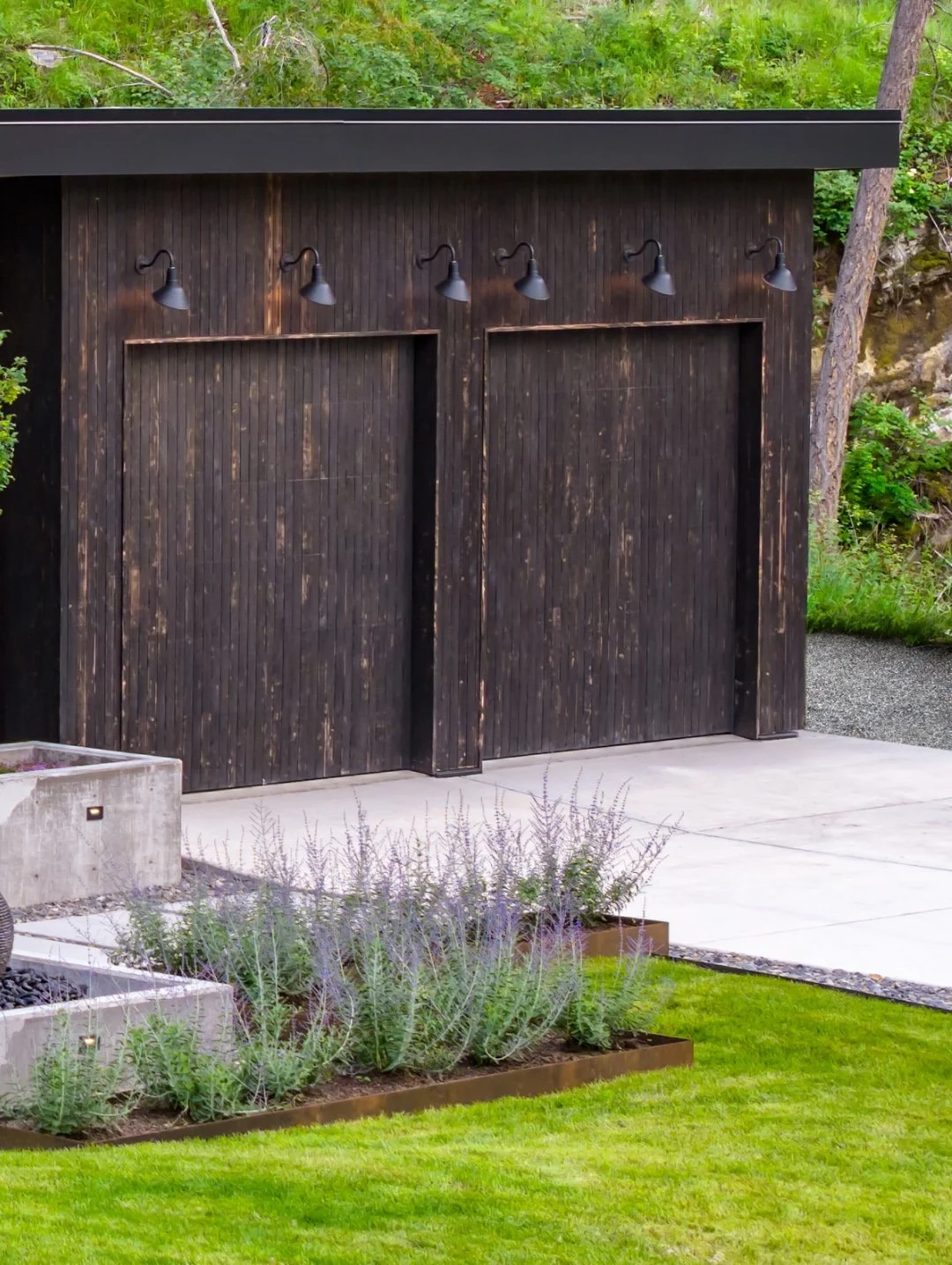 Shou Sugi Ban siding with custom Corten steel planters filled with Russian sage for the honey bees

📸 @kittykatboombat 
📐 designed by @lyonsbuilt Founder Jake Lyons