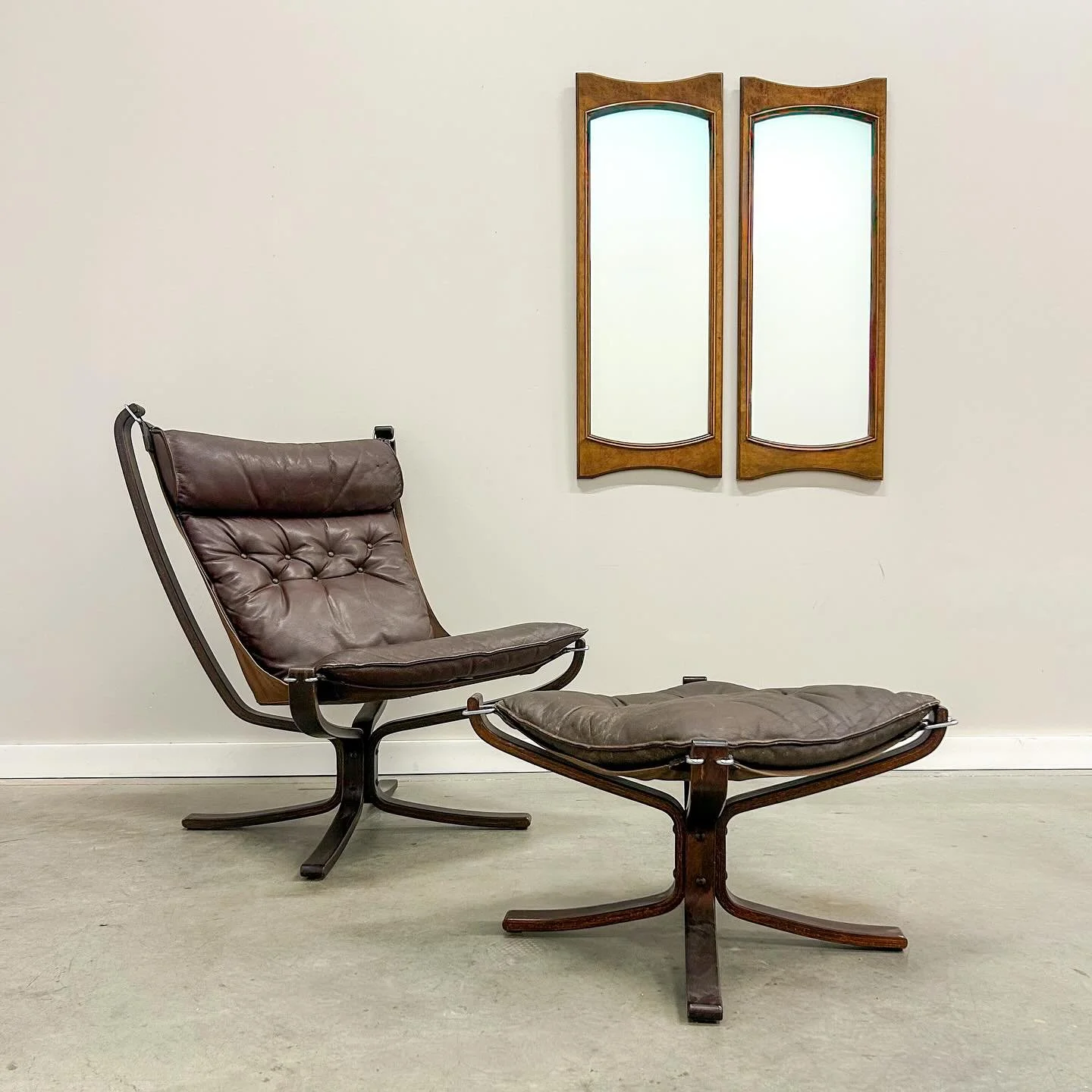 A classic piece of Scandinavian design history. The Falcon chair and ottoman by Sigurd Resell for Vatne M&oslash;bler combines sculptural form with effortless comfort, designed to look as light as it feels.

The leather has softened beautifully over 