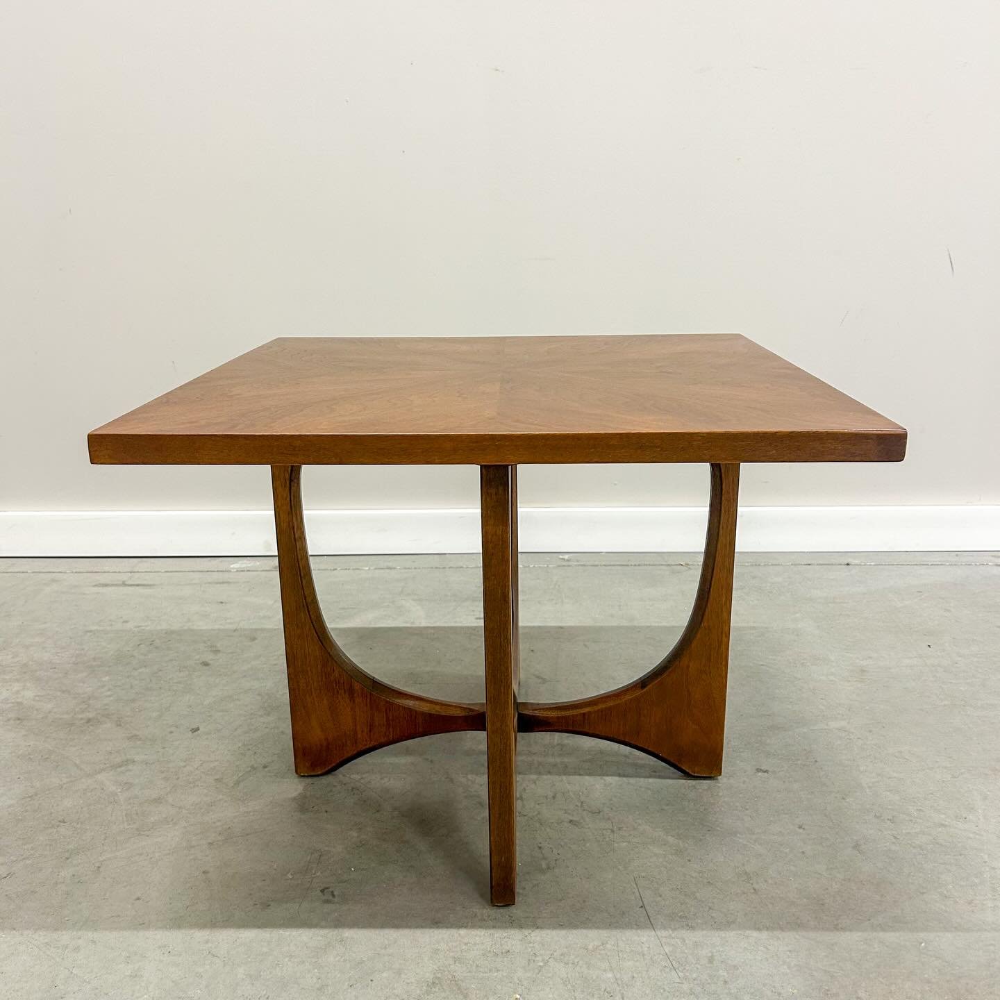 This Broyhill Brasilia lamp table blends a starburst walnut top with graceful mid-century lines, offering far more architectural presence than its modest footprint suggests. Available now.

26&rdquo; W x 26&rdquo; D x 20&rdquo; H

#mcmfurniture, #mid