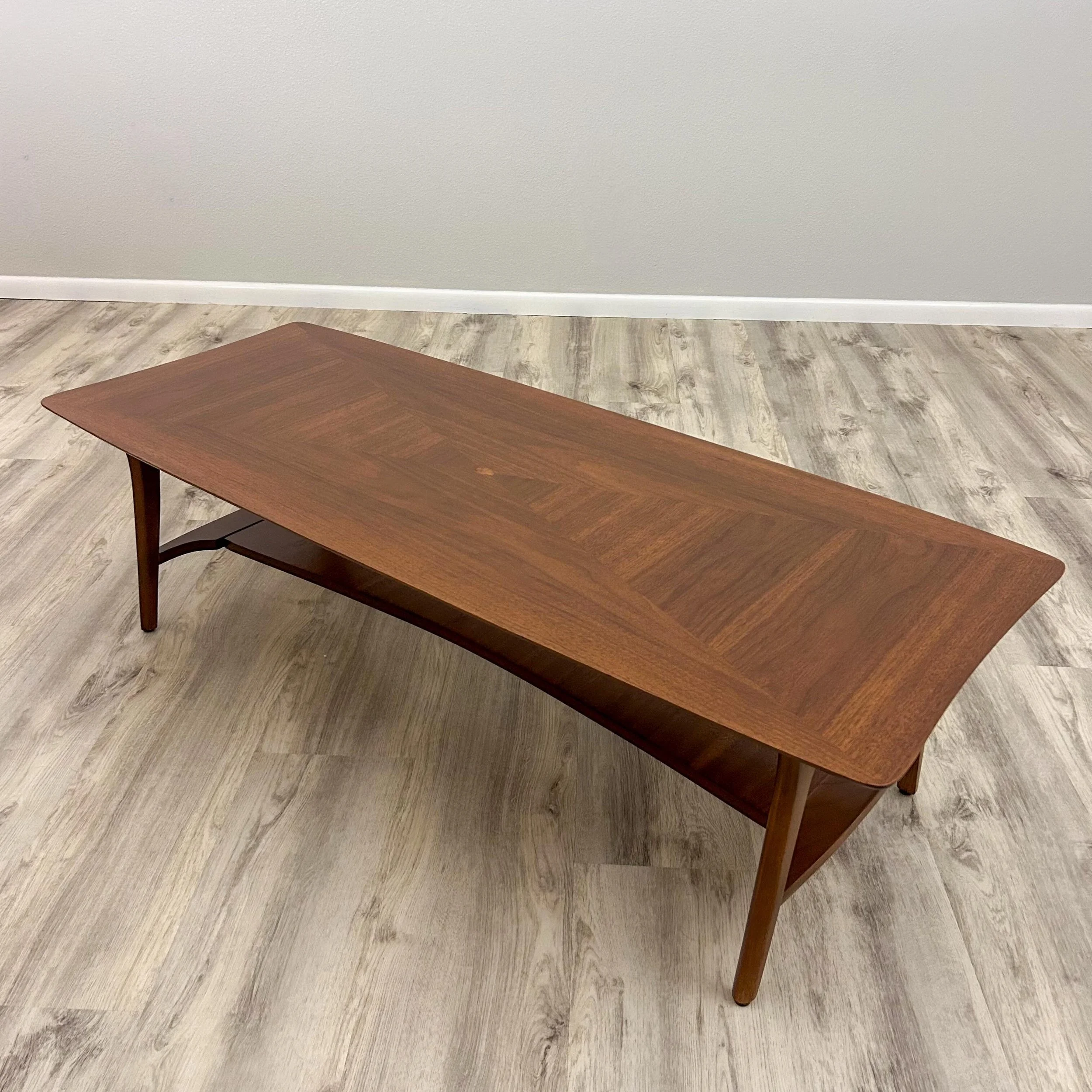 SOLD - Just refinished this stingray-style walnut coffee table. I&rsquo;m loving the design on this one with the diamond-patterned veneer top with a sweet little burl wood inlay in the middle. Now live on my website, link in bio.

51.75&rdquo;L x 21&