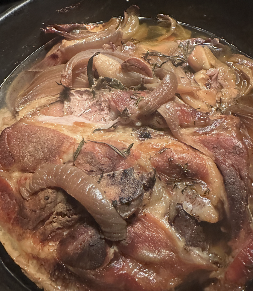 Slow-Roasted Pork Shoulder with Caramelized Onions and Herbs