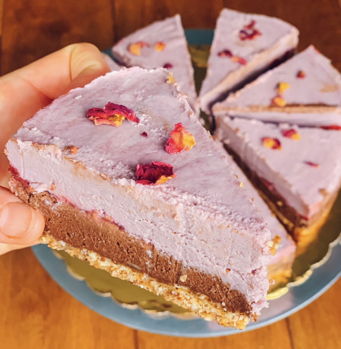 Hazelnut Chocolate Cheesecake with Brownie Crust and Strawberry Almond Butter Center