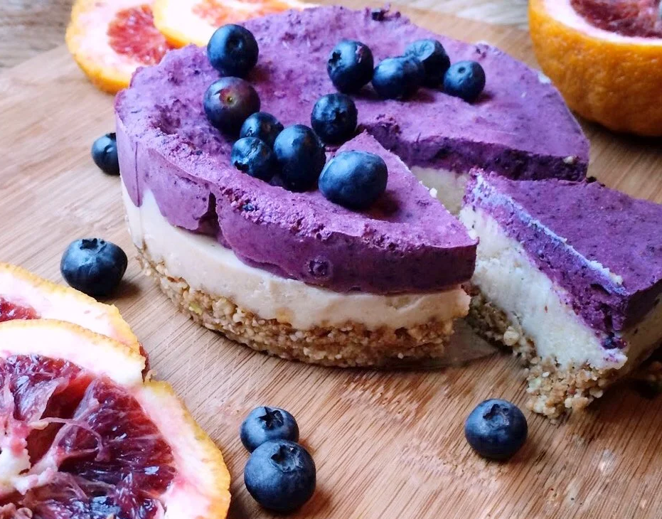 Raw Lemon Blueberry Cheesecake with Orange Cream Layer &amp; Berry Coulis
