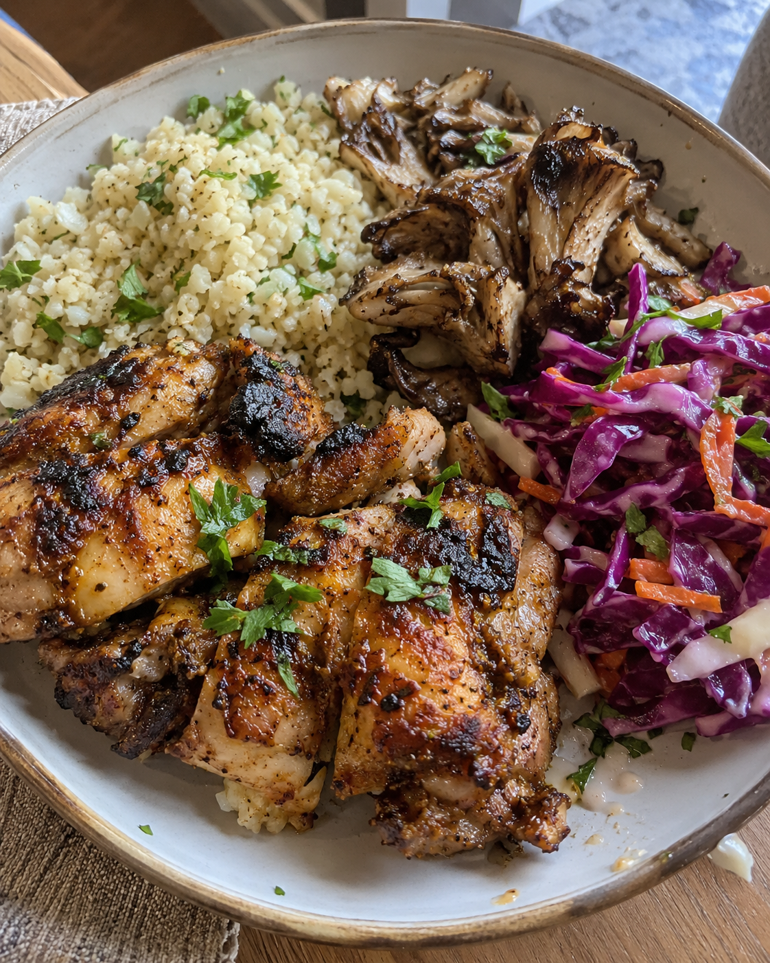 Shawarma-Spiced Grilled Chicken Thighs, Cauliflower Rice, Maitake msuhrooms, and Baja Purple Cabbage Slaw