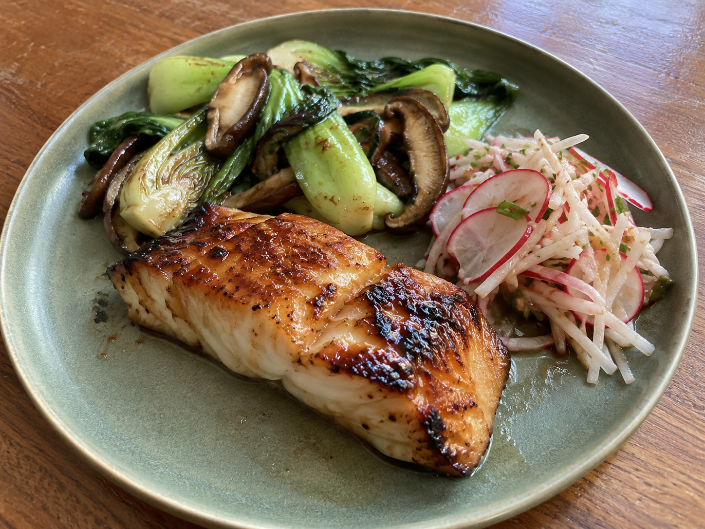 Miso-Glazed Fish with Ginger Bok Choy, Shiitake, and Crunchy Radish Slaw