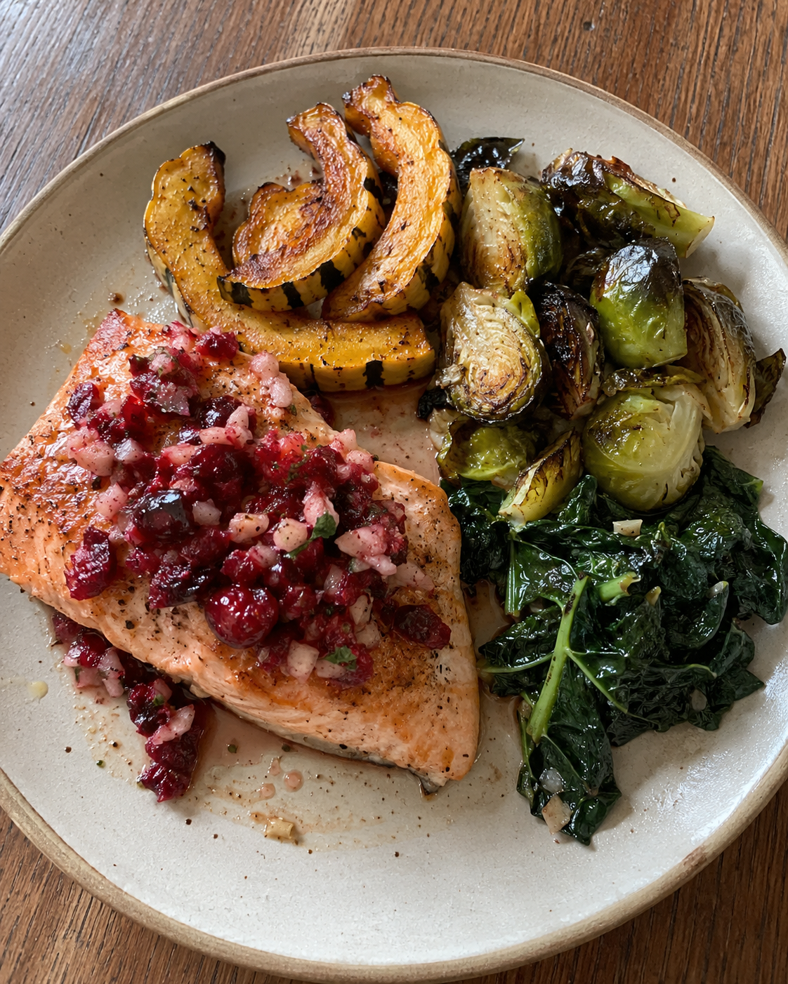 Wild Salmon with Fresh Cranberry-Horseradish Relish, Roasted Delicata, Brussels Sprouts, and Wilted Greens