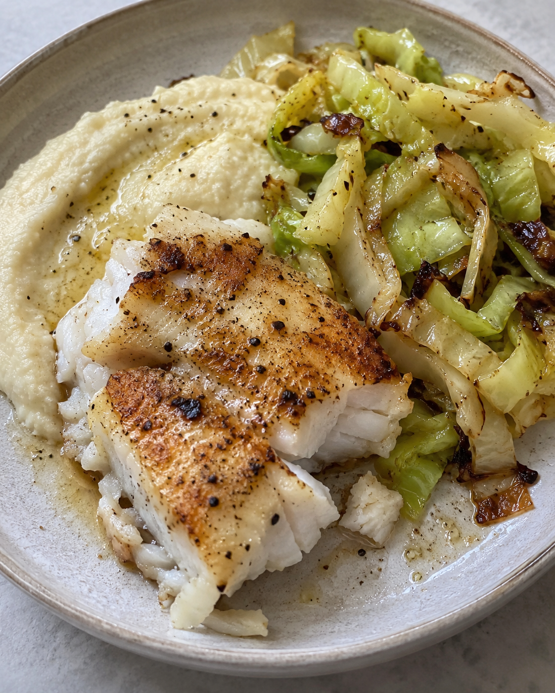 Wild Cod with Sautéed Cabbage and Cauliflower-Leek Purée