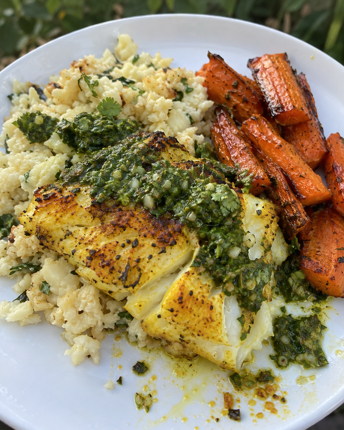 Turmeric-Ginger Wild Fish with Coconut Cauliflower, Coriander-Mint Chutney, and Roasted Carrots