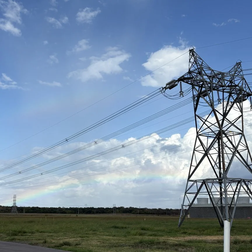 Rainbow and transmission lines at the Hugo Plant