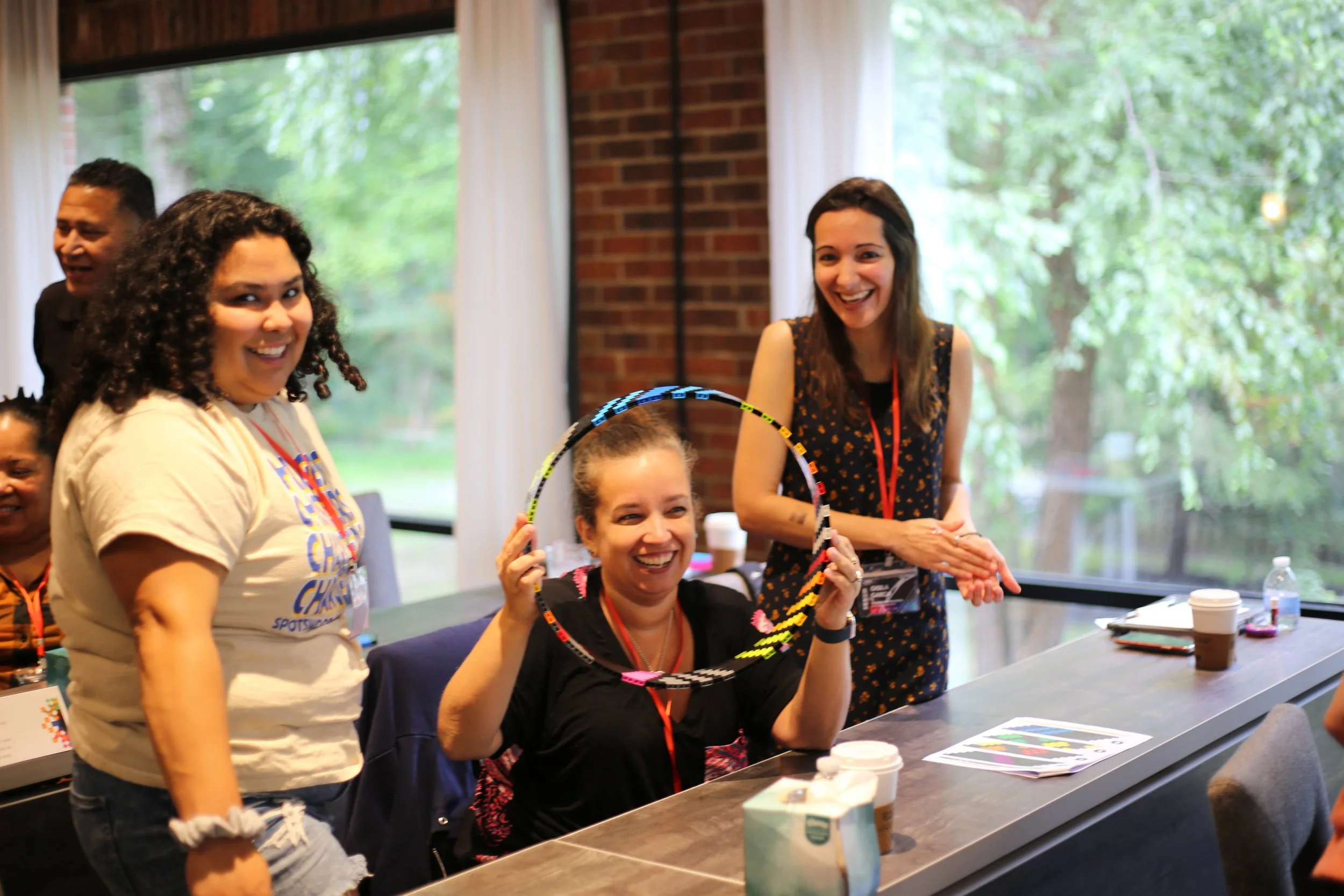 Advisors building legos at 2024 conference
