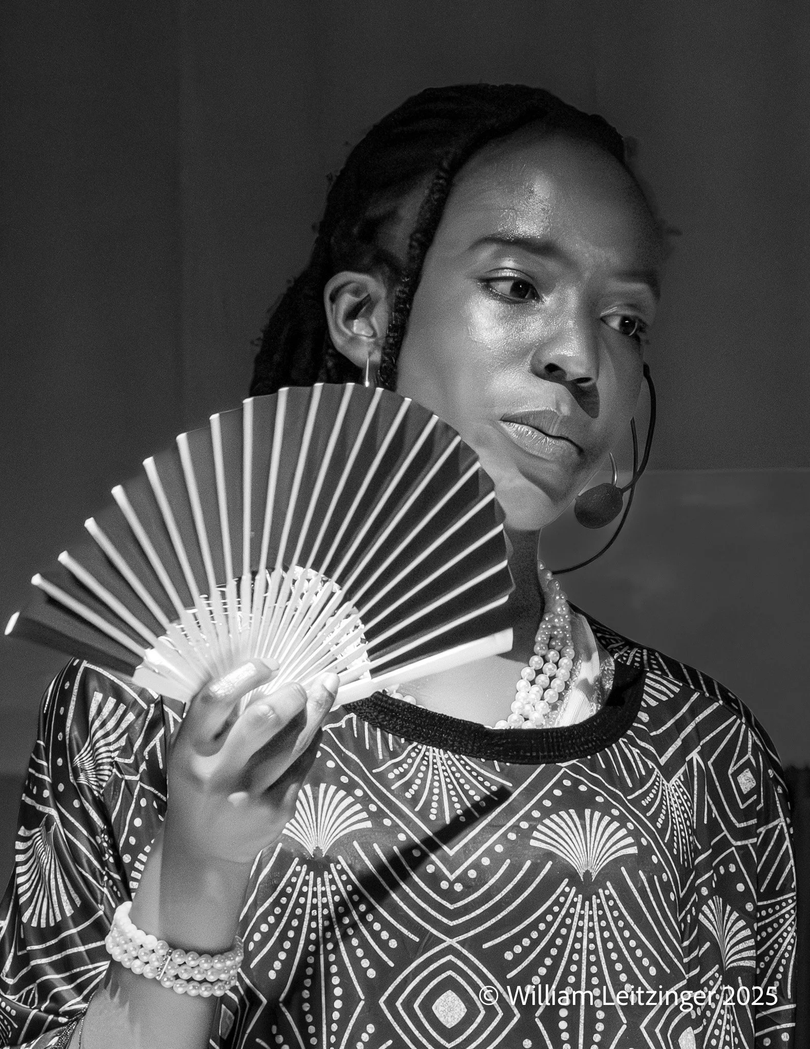20260424-Family-Event-Anastasia_Musical-Black_Young_Woman_with_Fan-257-B&W-Cropped_8.5x11-(Copyright) copy.jpg