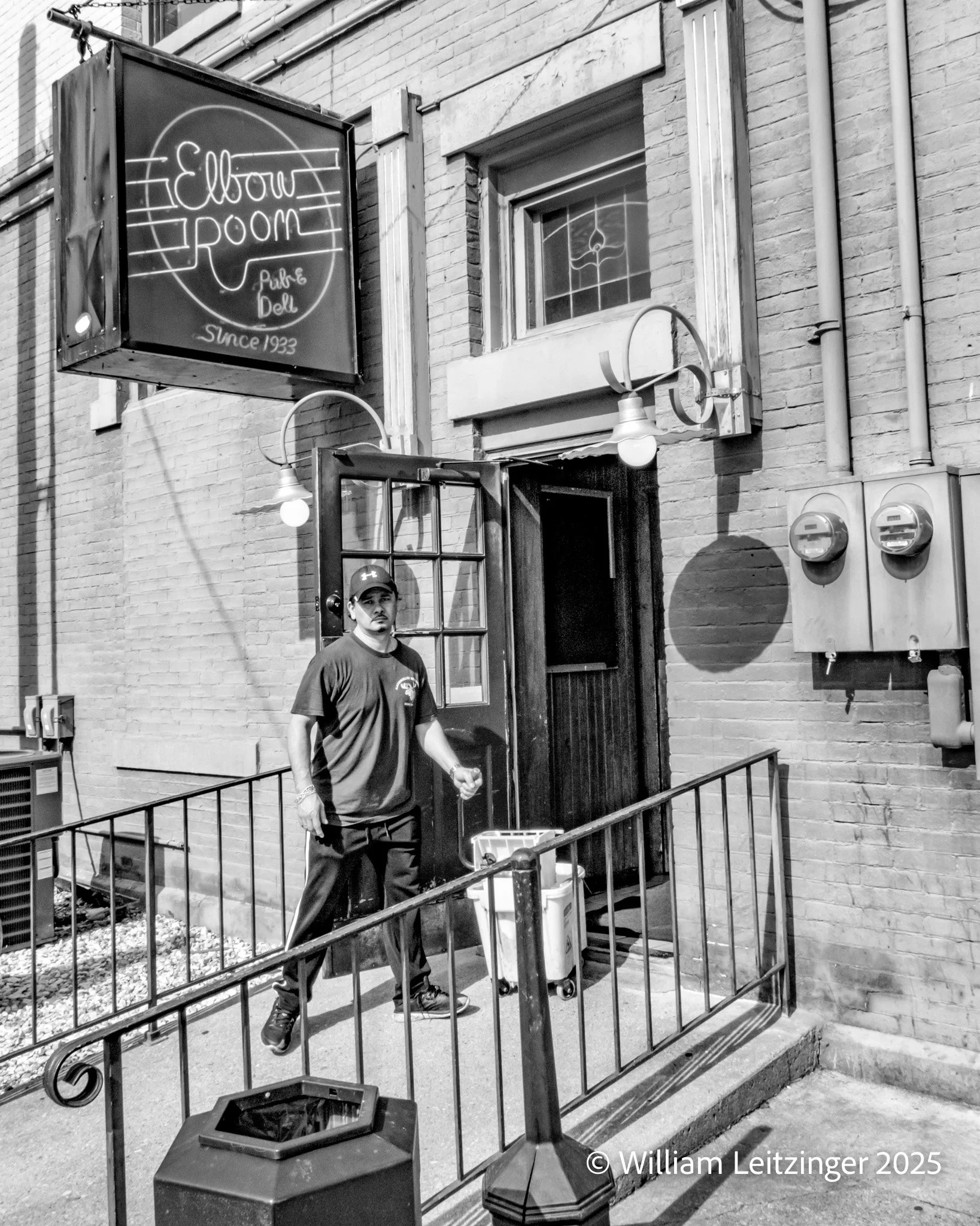 20170327-Urban-IN-Indianapolis-Man_Outside_Elbow_Room_Pub-B&W_Edit-(Copyright).jpg