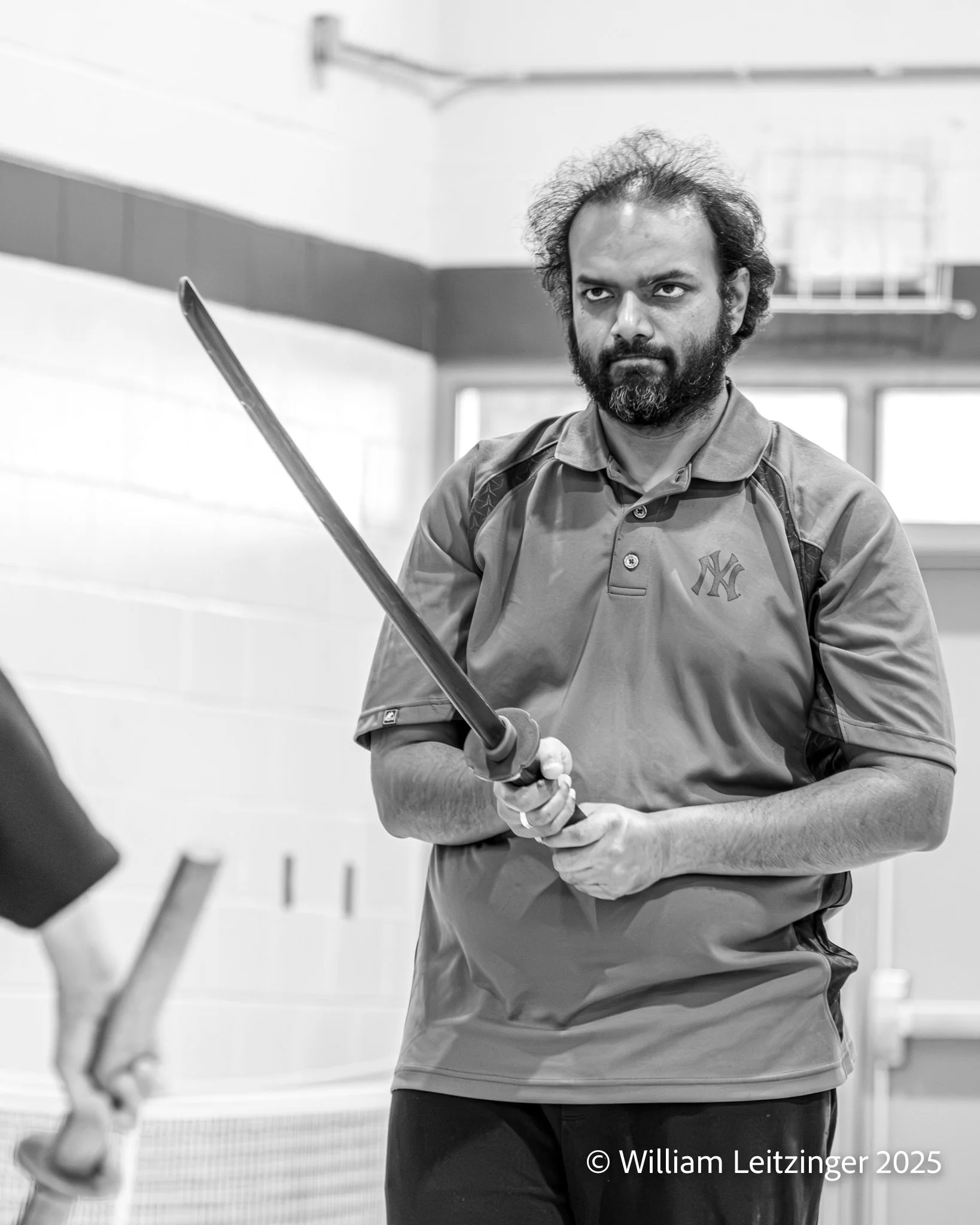20241201-Portrait-VA-Herndon-Man_Practicing_with_Katana_Wooden_Sword-B&W-01.jpg