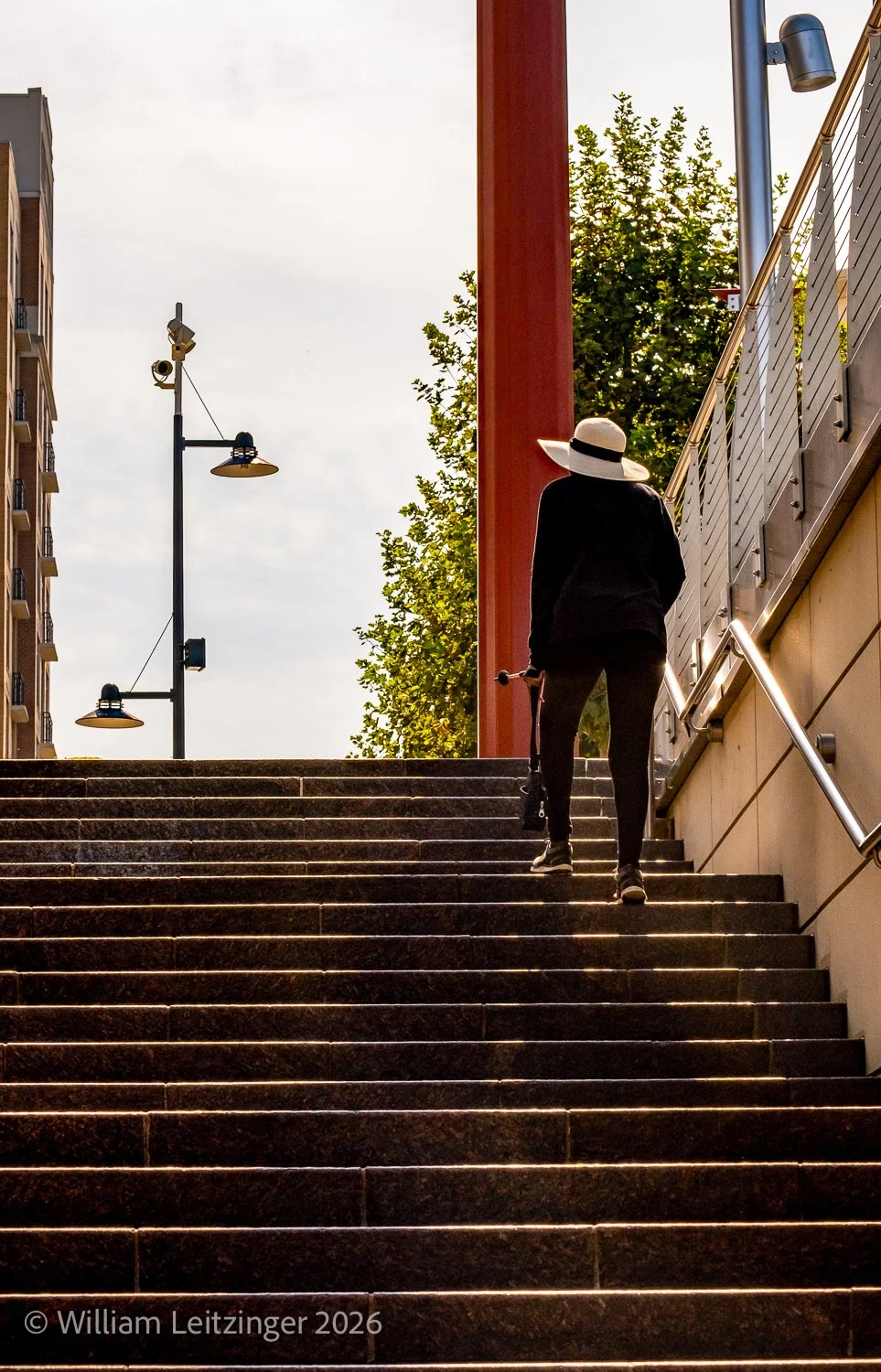 20230909-MD-National_Harbor-Woman_Walking_Up_Steps-01-Final-(Copyright).jpg