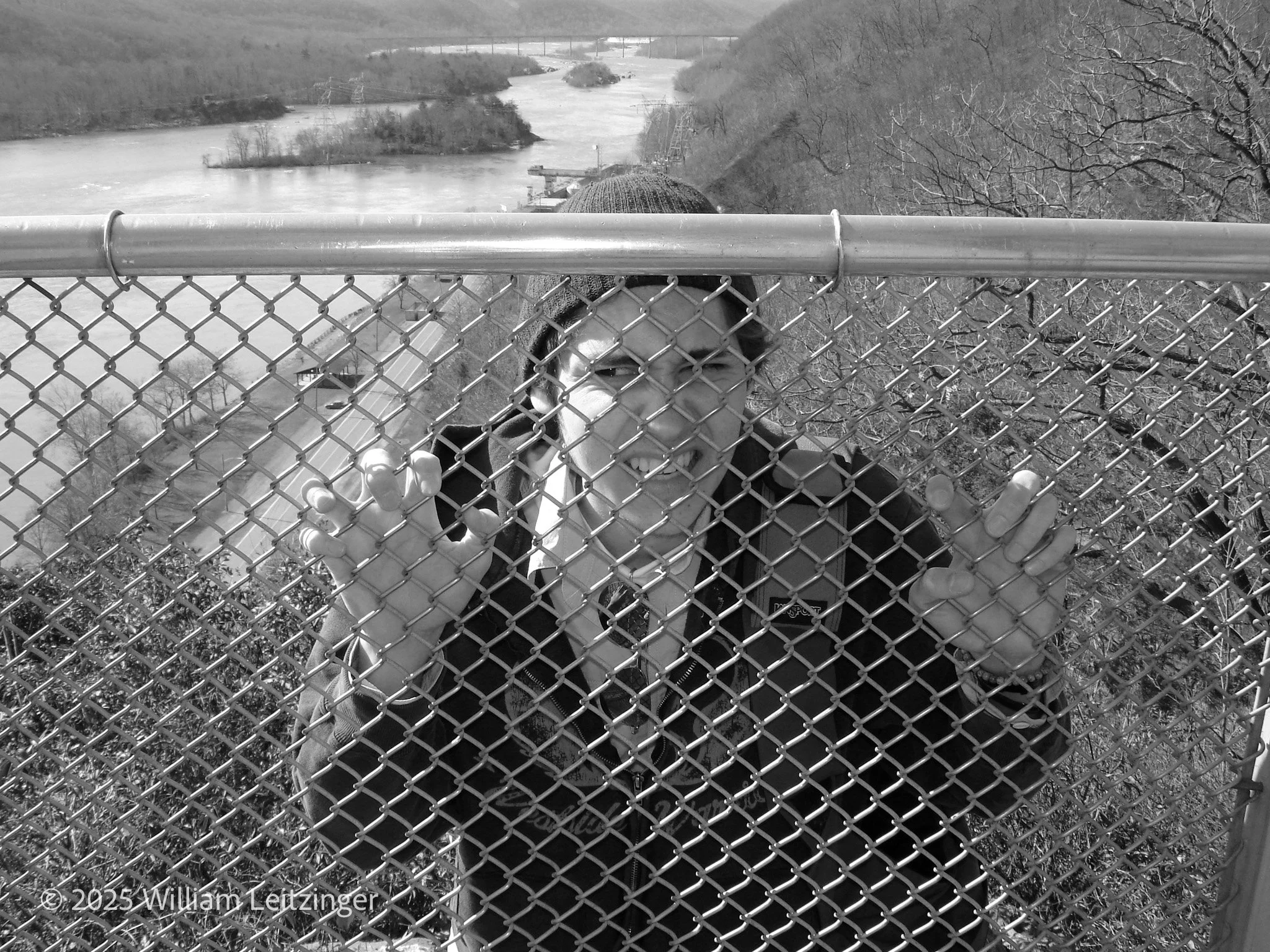 20080320-Hiking-MD-Havre_de_Grace-Susquehanna_State_Park-WIll_Mugging_on_Fence_By_Susquehanna_River-01-B&W-(Copyright).jpg