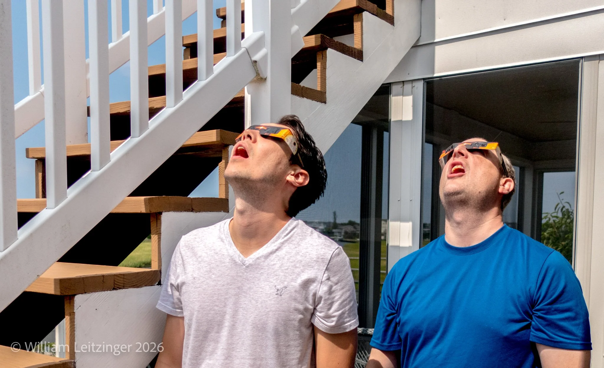 20170821-Family-Travel-DE-Bethany_Beach-Will_Leitzinger_&_Mike_Jolly_Looking_at_Sun_Eclipse-01-(Copyright).jpg