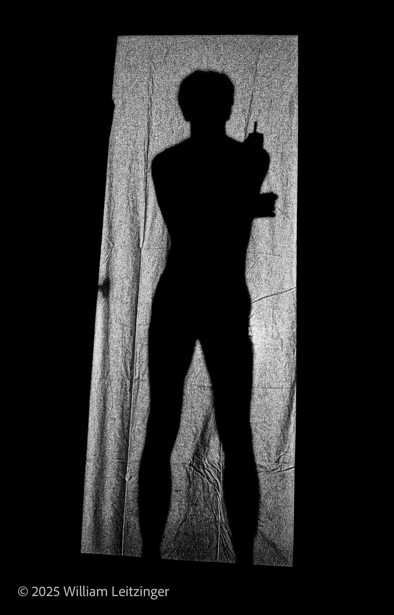 1980-Portrait-RI-Providence-Shadow_of_Man_with_Cigarette-01-B&W-(Copyright).jpg