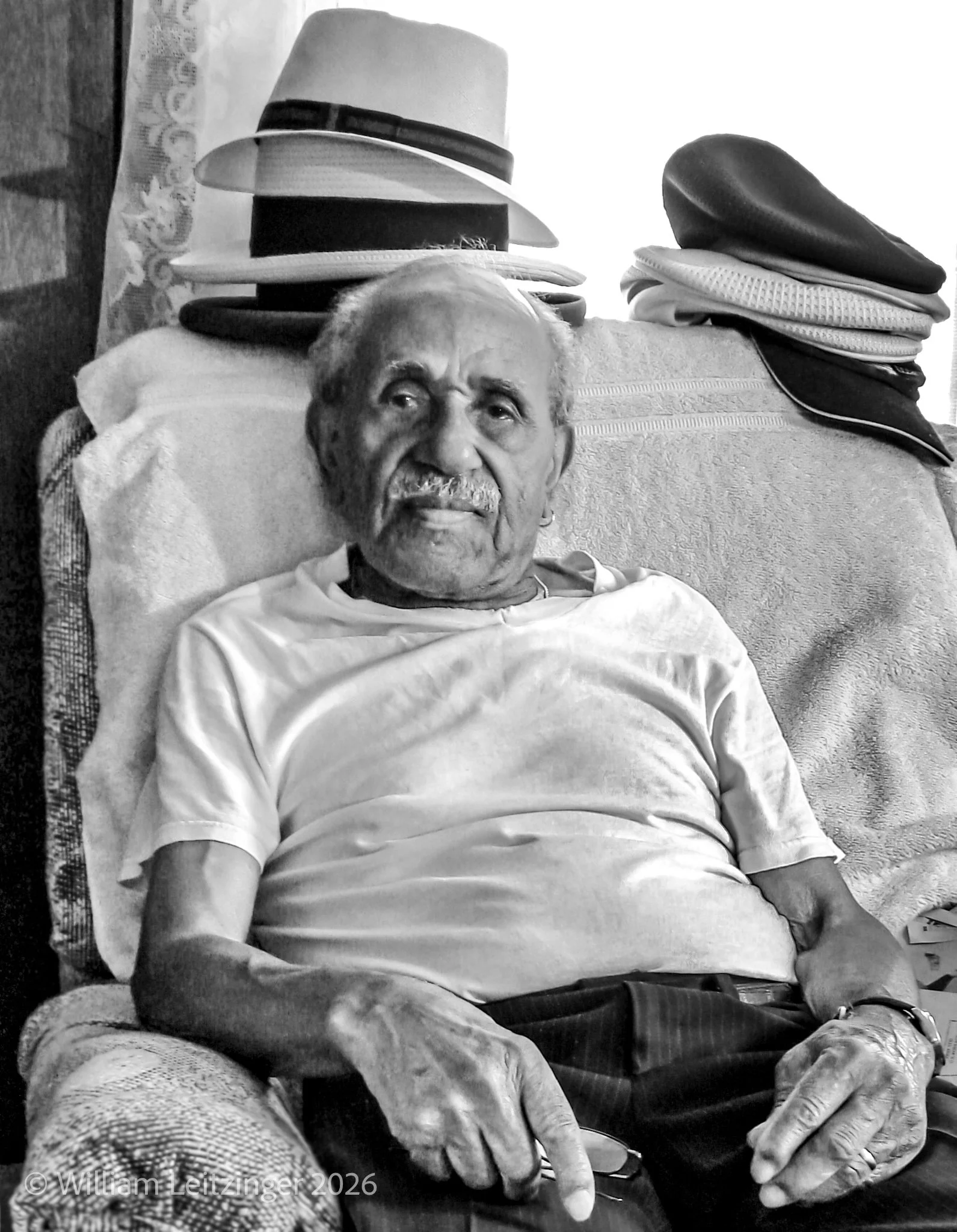 20080801-Portrait-DE-Delaware_City-Old_Black_Man_with_Hats-01-B&W-Final_Edit-(Copyright).jpg