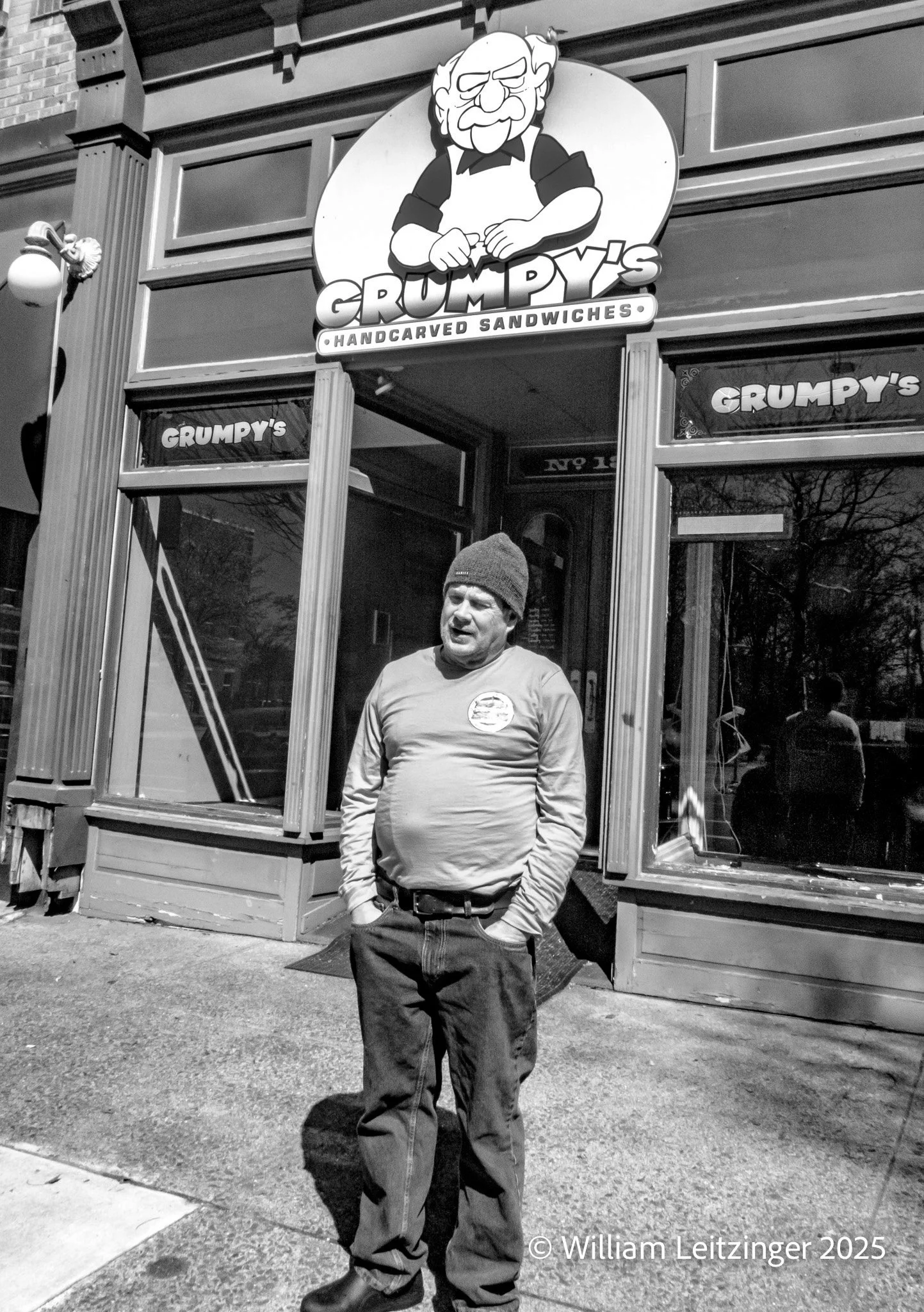 20240324-Urban-PA-Pottstown-Man_Standing_in_Front_of_Grumpy's-01-B&W.jpg