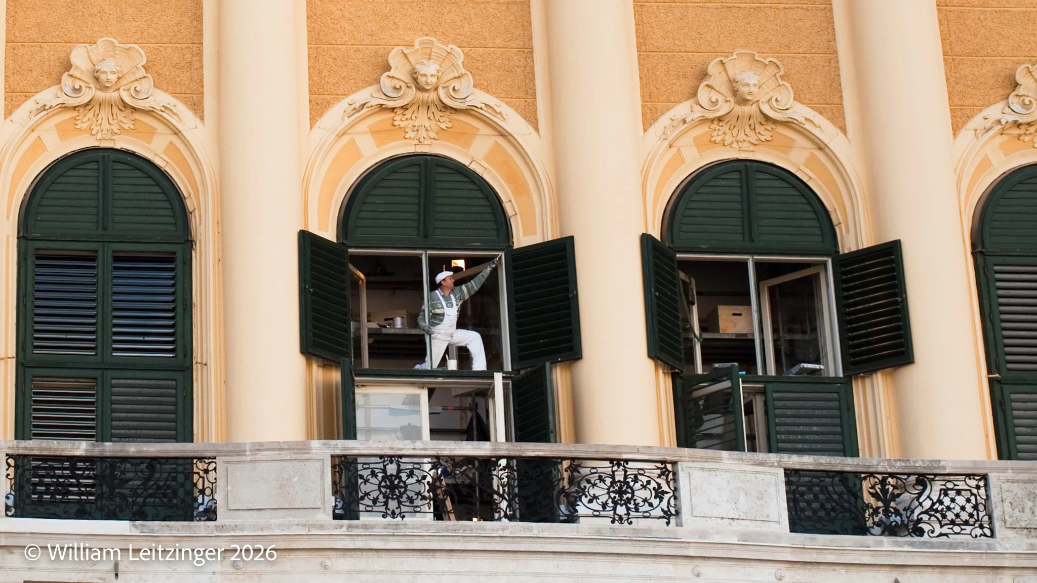 20101105-20101105-Travel-Urban-Austria-Vienna-Man_Painting_Palace_Window-Schoenbrunn_Palace-01-Cropped_16x9-(Copyright).jpg