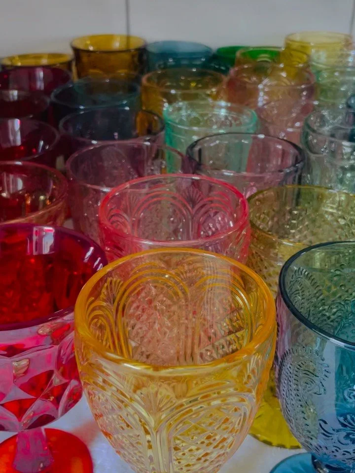 Even in the chaos&mdash;there&rsquo;s beauty. ✨

After a full weekend of events, my sink is full, my feet are tired&hellip; and my heart is so full. Seeing this rainbow of colorful goblets all together&mdash;each one touched by a celebration, a toast
