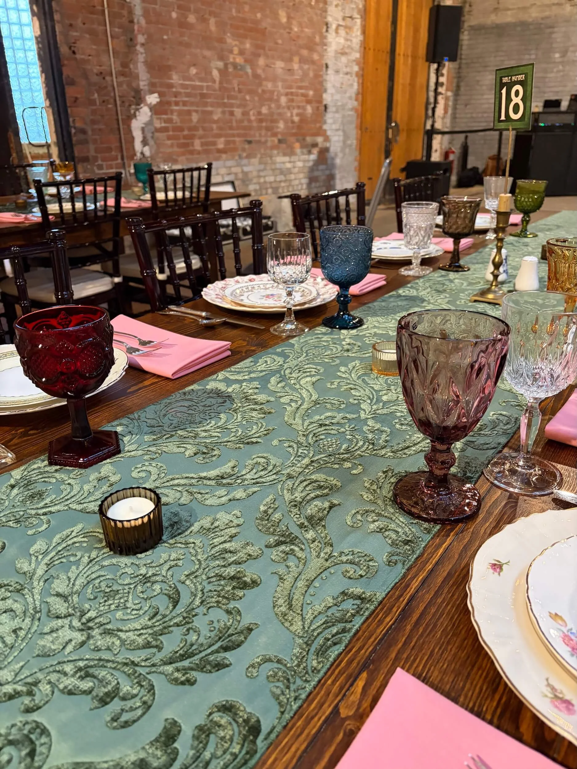 Red Brown Purple Amber Blue Goblets at Setting at the Jam Handy.jpeg