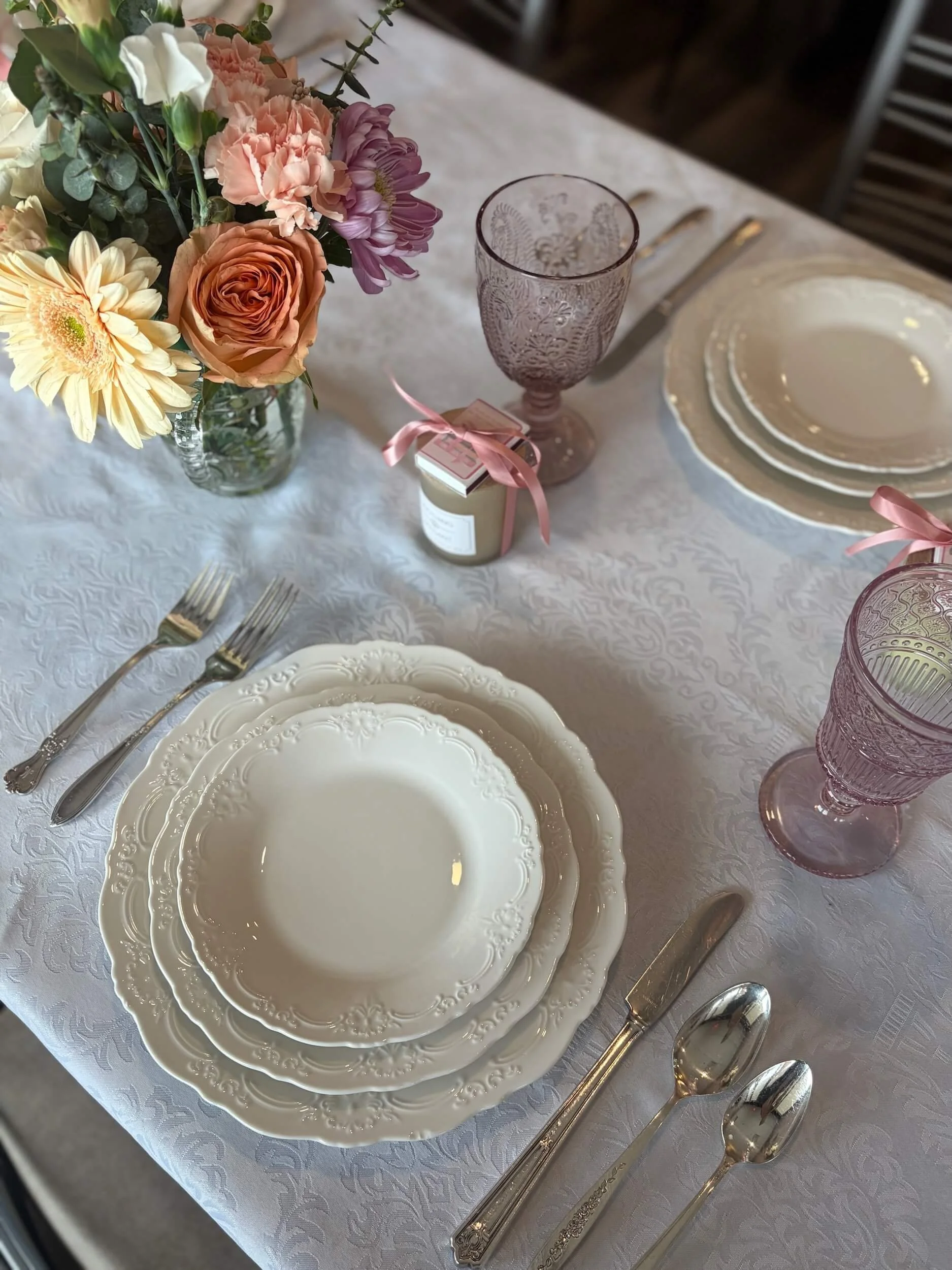 Vera White Plate Rentals Pink Goblets.jpeg