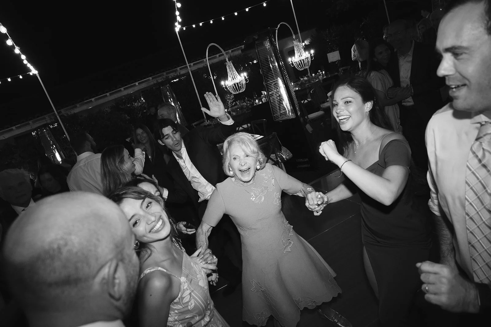 Grandma dancing on the dance floor to celebrate with the bride and groom. Digital. 