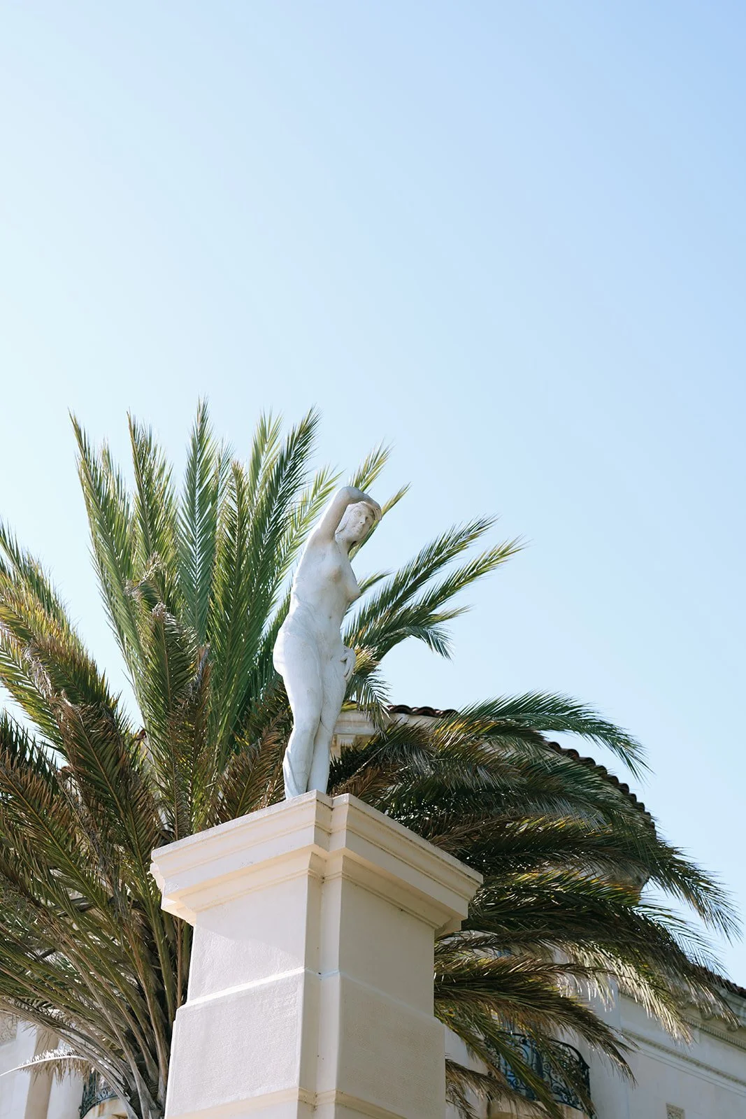 statue of a woman outside of luxury malibu estate