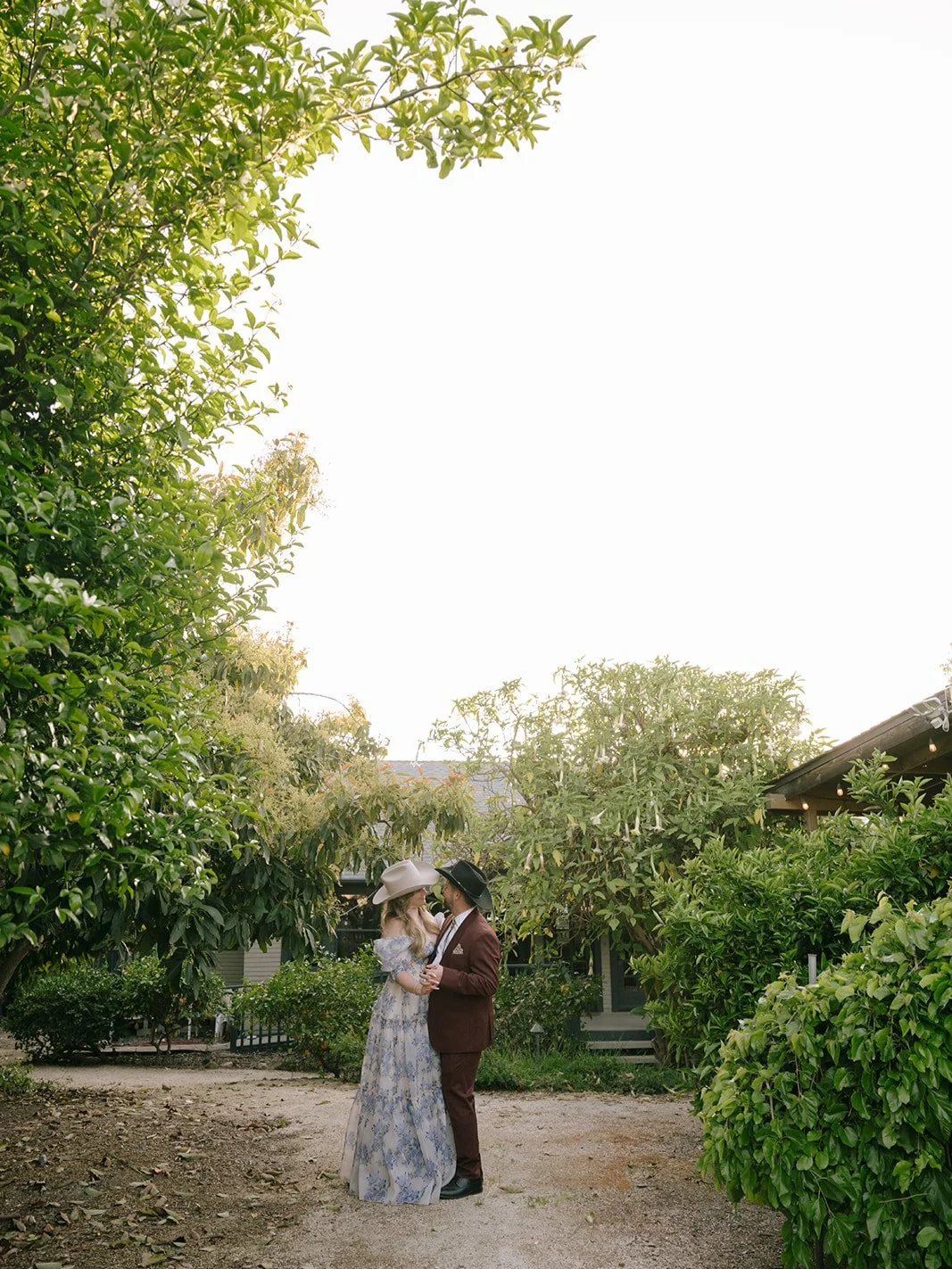 The bride and groom dancing privately
