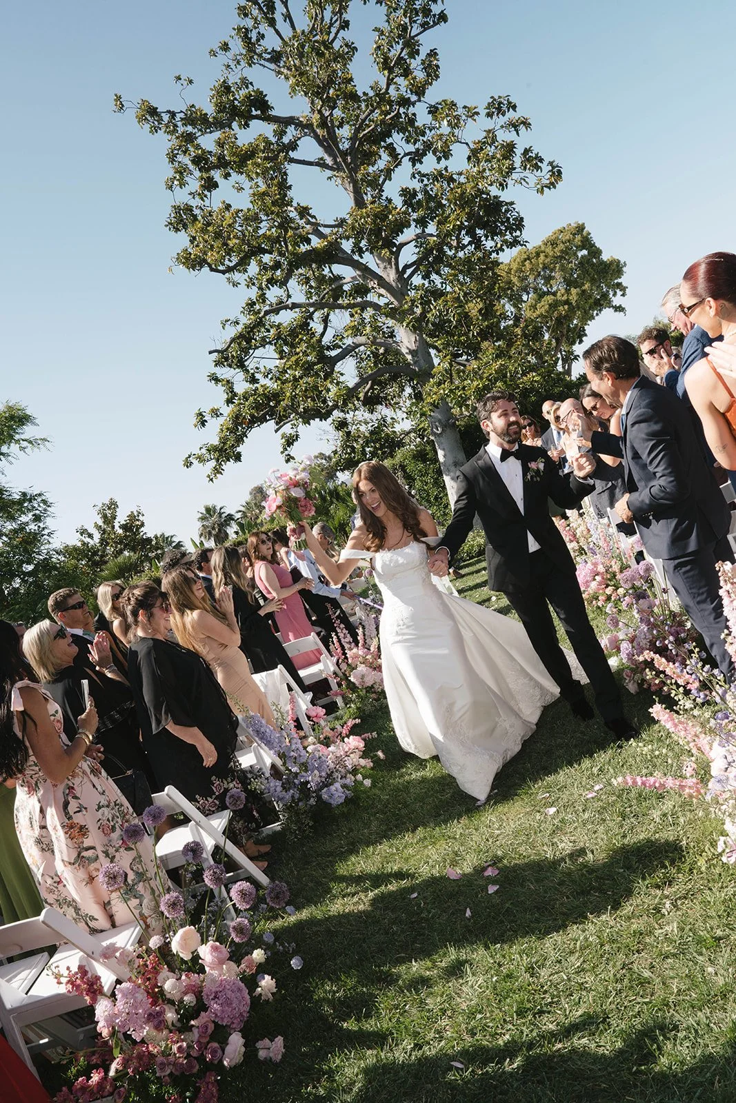  Newlywedded bliss during the recessional. Digital. 