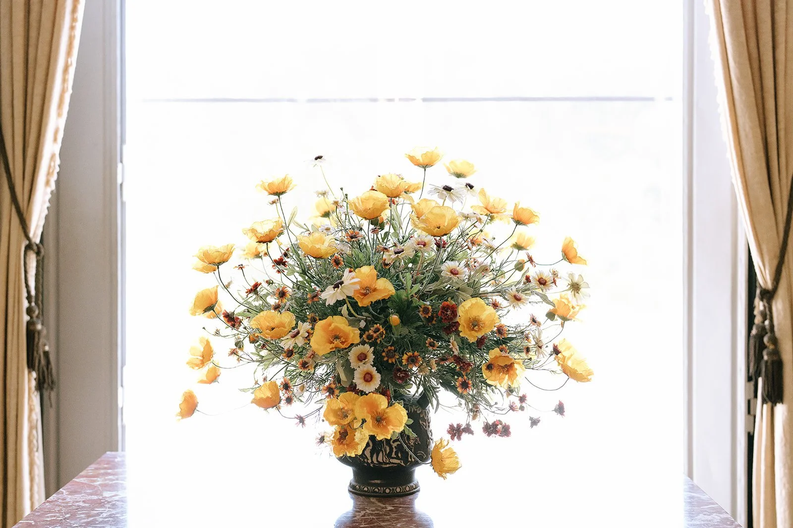 Fresh yellow cottagecore wildflower display in the Villa Ephrussi de Rothschild