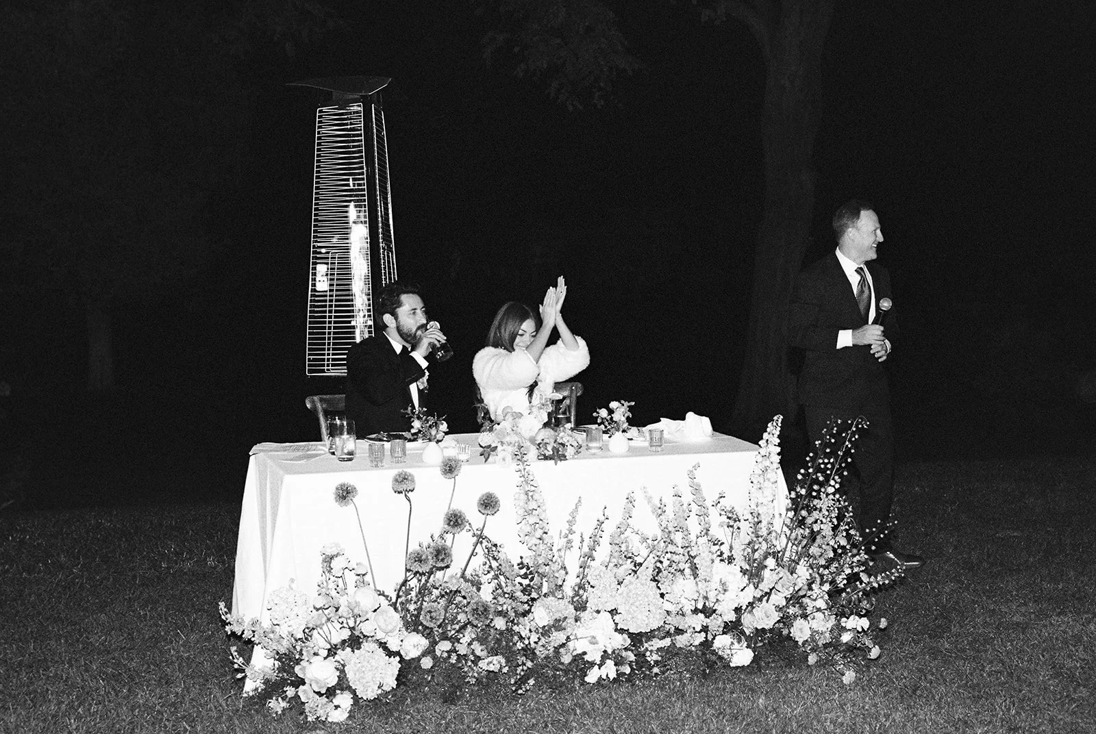  Toasts are given by loved ones. Digital. 