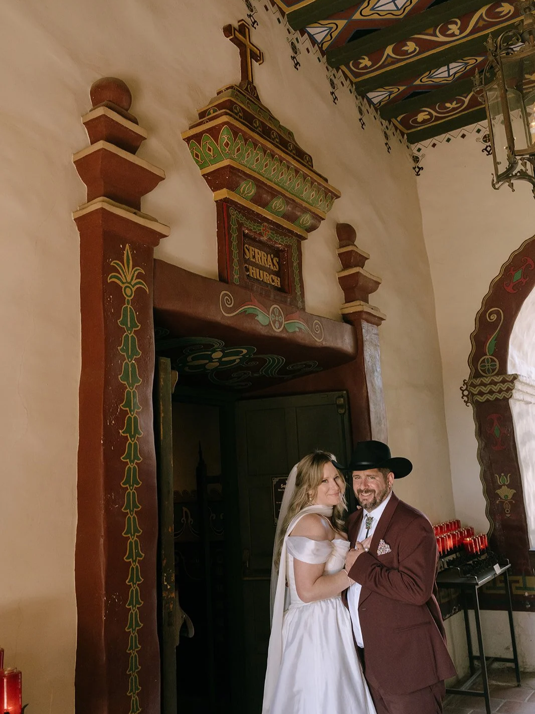 The bride and groom smiling