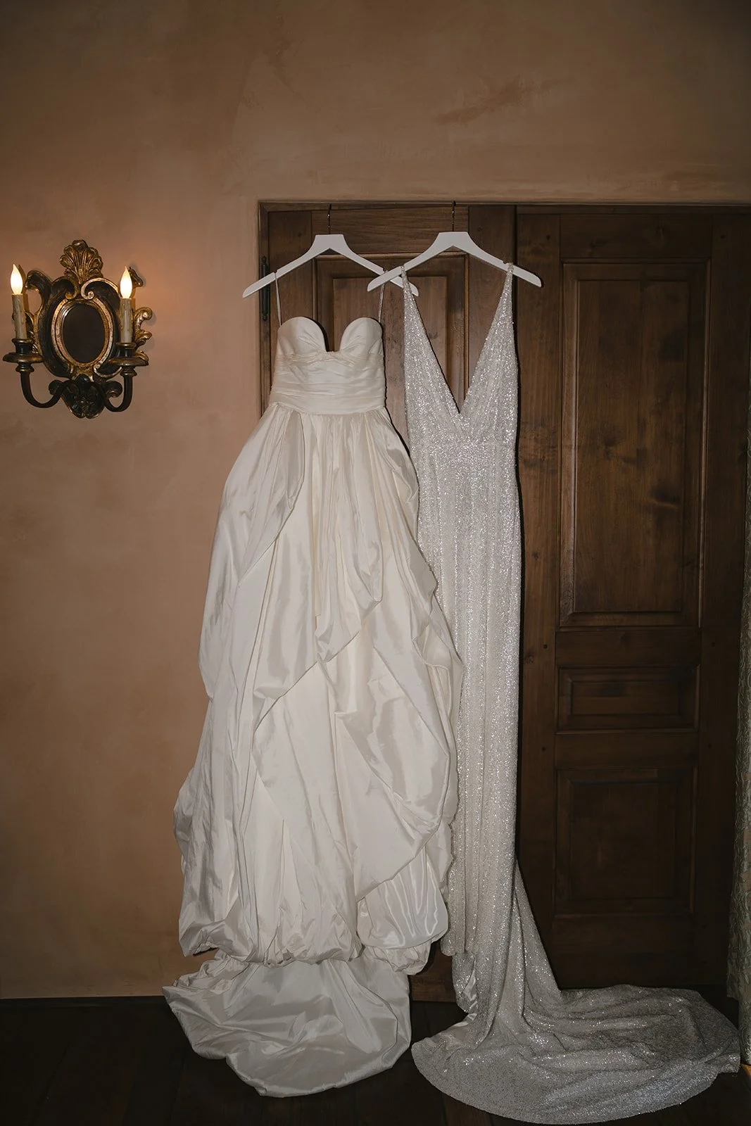 The wedding and reception gowns hanging