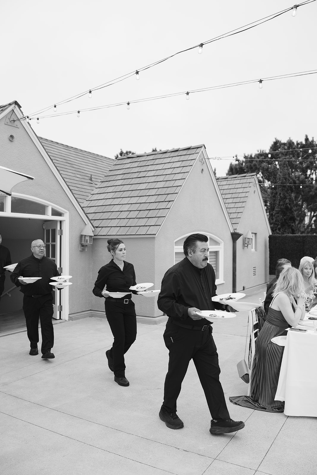 Dinner being served to the wedding guests/