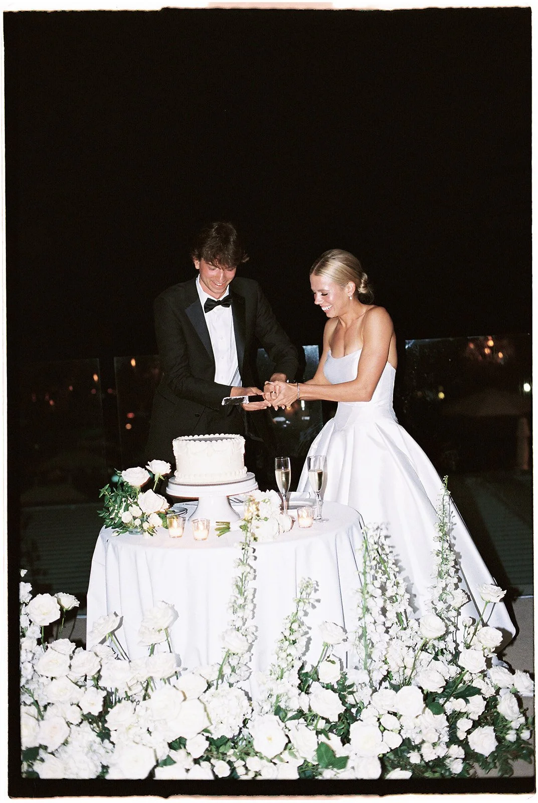 Bride and Groom cutting their cake