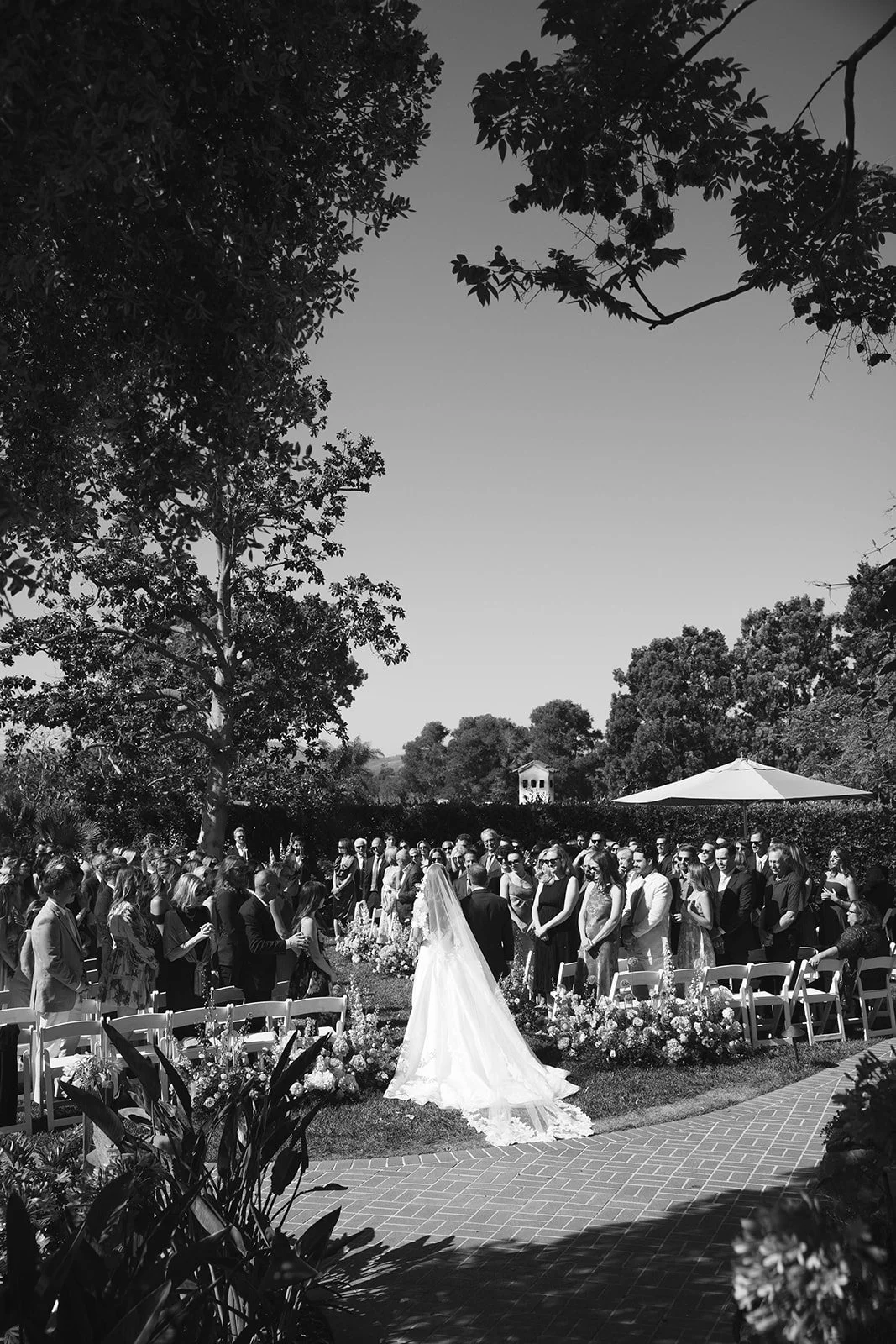  The bride prepares to walk down the aisle. Digital. 