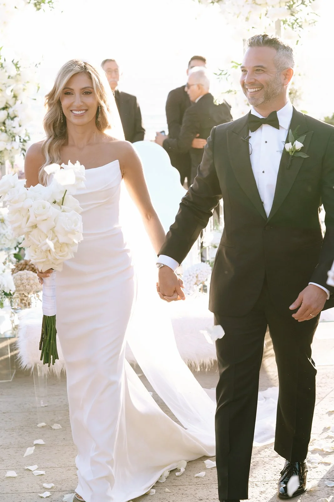 walking down the aisle flower petal rose toss gol baroon